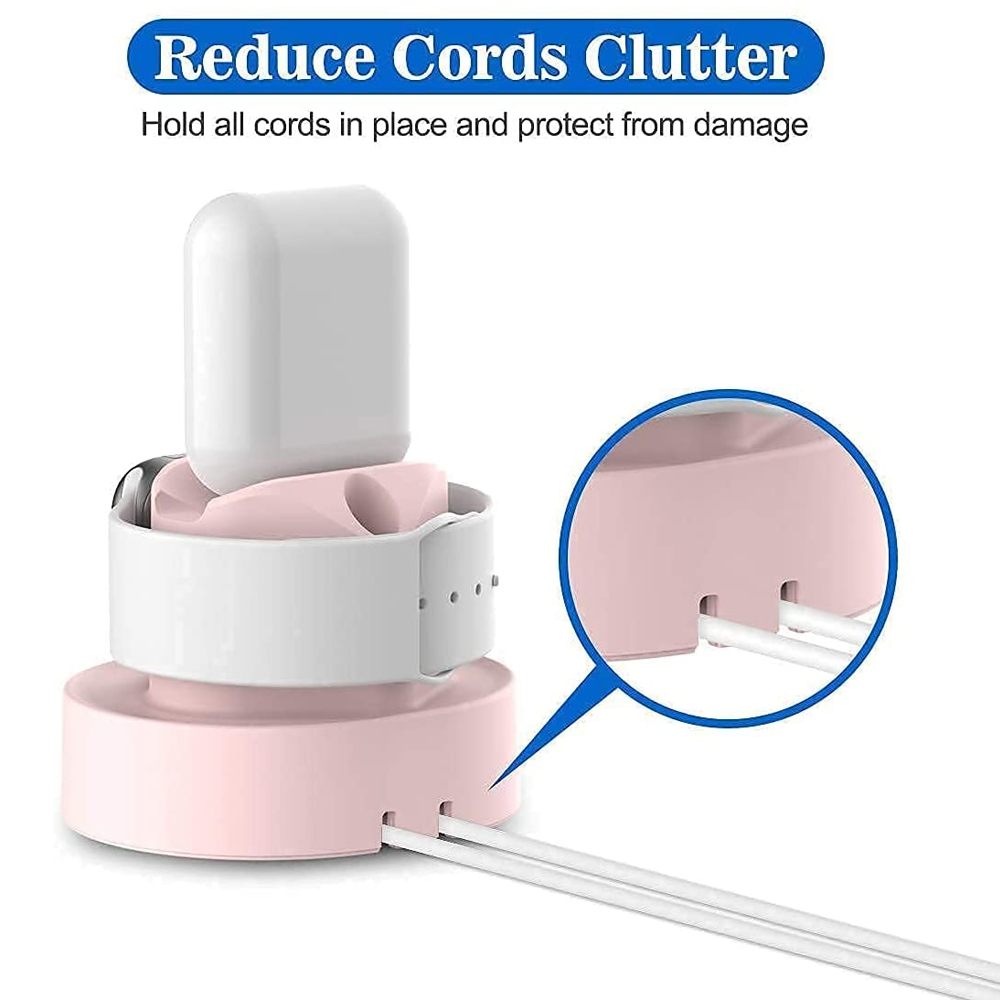 Ein rosa-weißer Ladeständer für Ohrhörer und eine Uhr, bei dem die Kabel von hinten sichtbar sind.