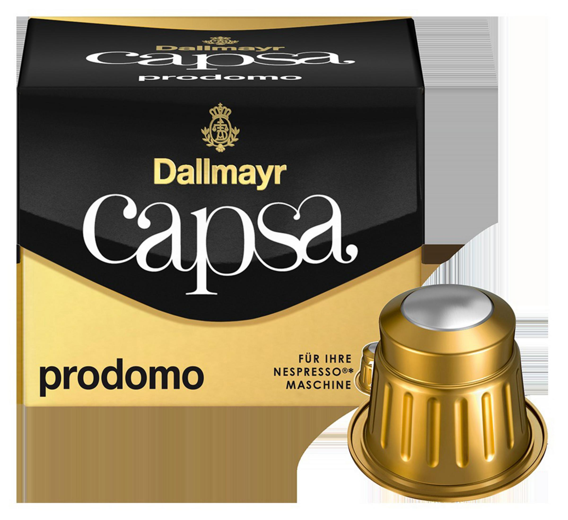 Eine Schachtel Dallmayr Capa Prodomo Kaffeekapseln mit einer goldenen Kapsel daneben.