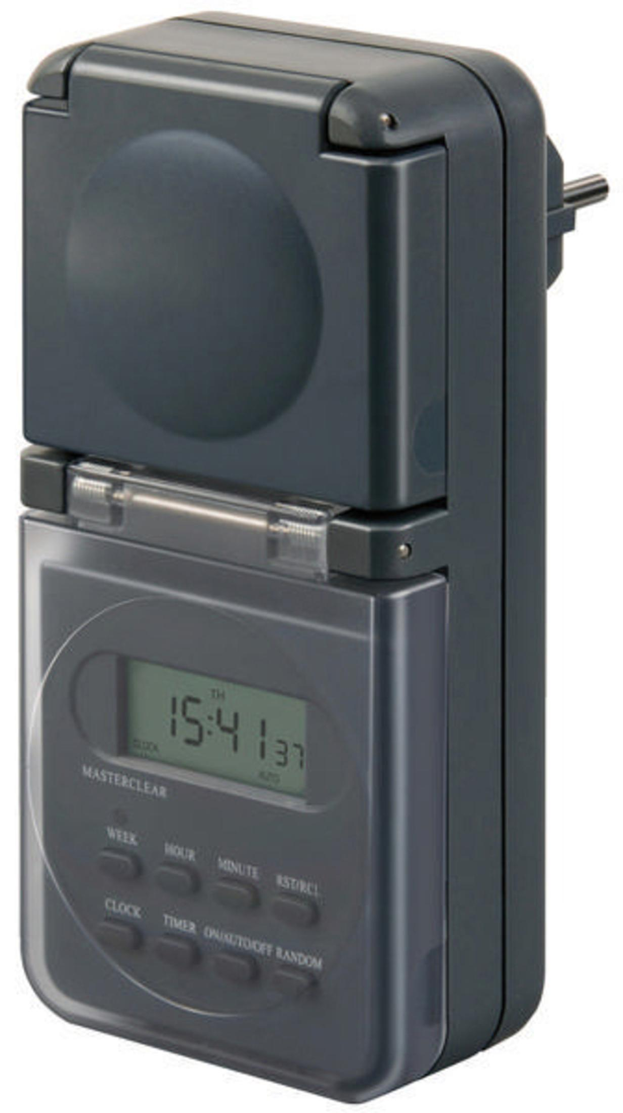 Un timer digitale grigio con una spina sulla parte superiore e diversi pulsanti e display digitale sulla parte anteriore.