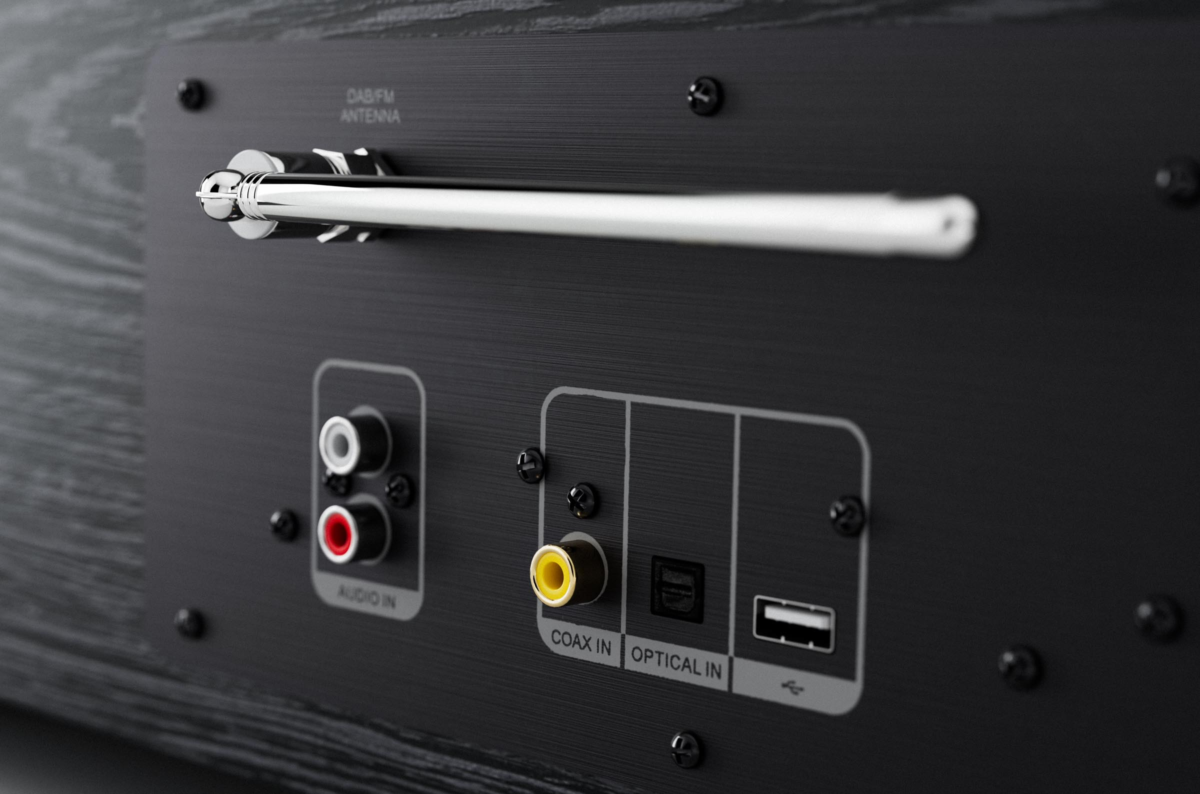 Close-up of the back panel of a black audio device showing antenna and connection ports.