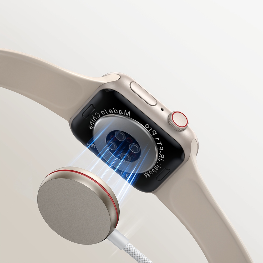 Nahaufnahme einer Smartwatch, die mit einem magnetischen Ladegerät mit einem weißen Kabel aufgeladen wird.