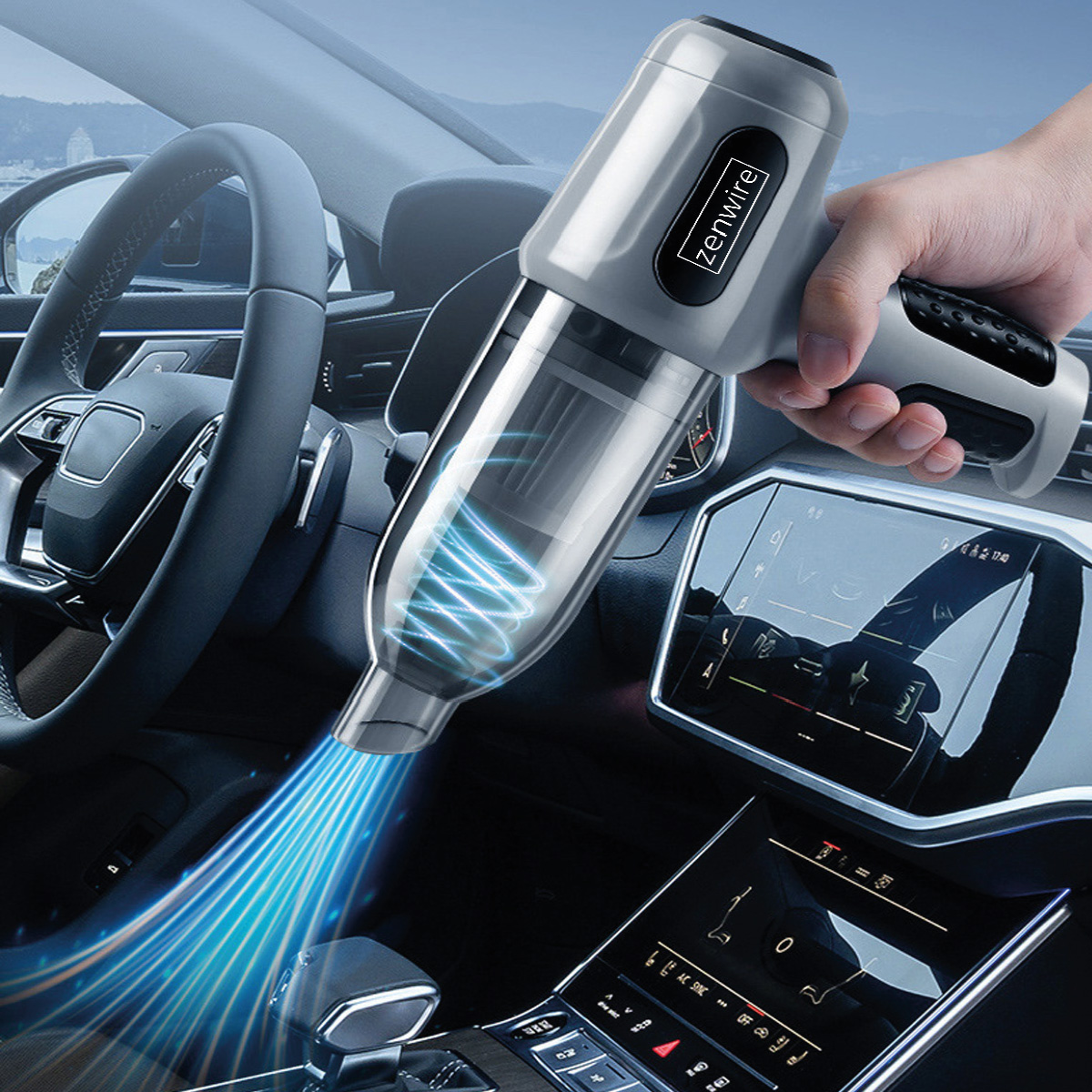 Szary odkurzacz ręczny Zenwire używany wewnątrz samochodu, podkreślający jego przenośność i możliwości czyszczenia samochodu.