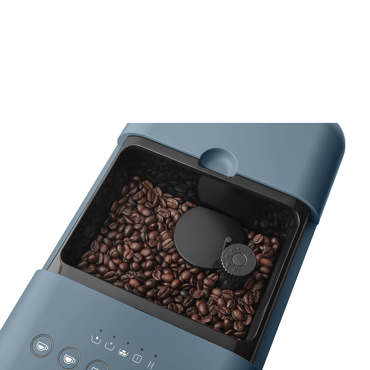 Primer plano de granos de café dentro de una cafetera SMEG azul, con botones de control visibles.