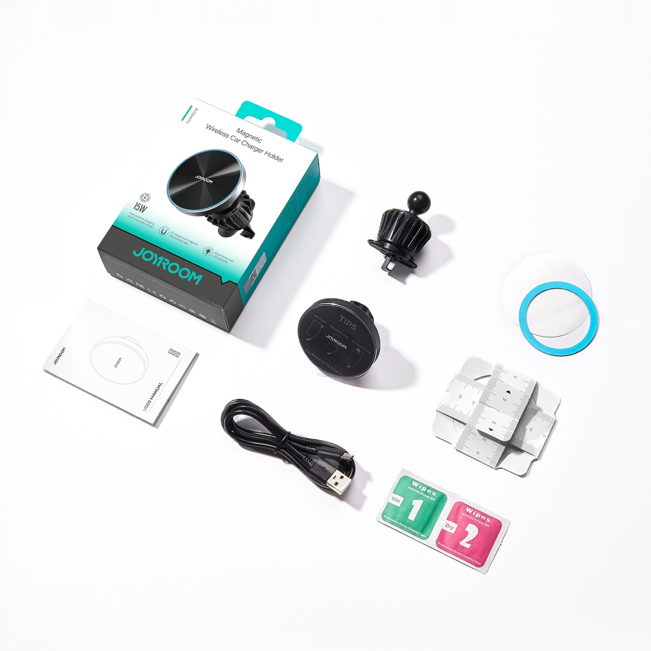 Magnetyczny bezprzewodowy uchwyt samochodowy do ładowarki JOYROOM rozpakowany na białej powierzchni ze wszystkimi elementami.
