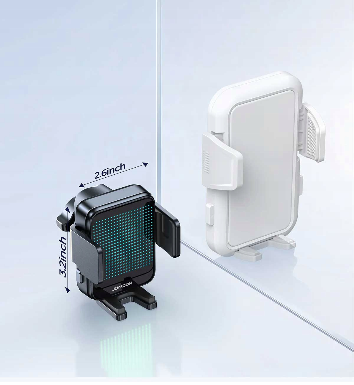 Uchwyt samochodowy do telefonu z oznaczonymi wymiarami, umieszczony w pobliżu białego telefonu. Jest odizolowany na białym tle.