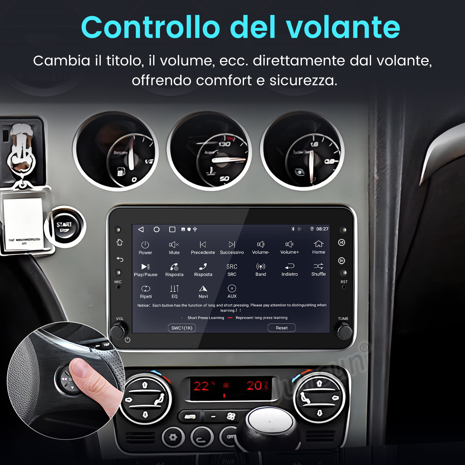 Volante dell'auto con pulsanti di controllo del volume e cruscotto con interfaccia autoradio.