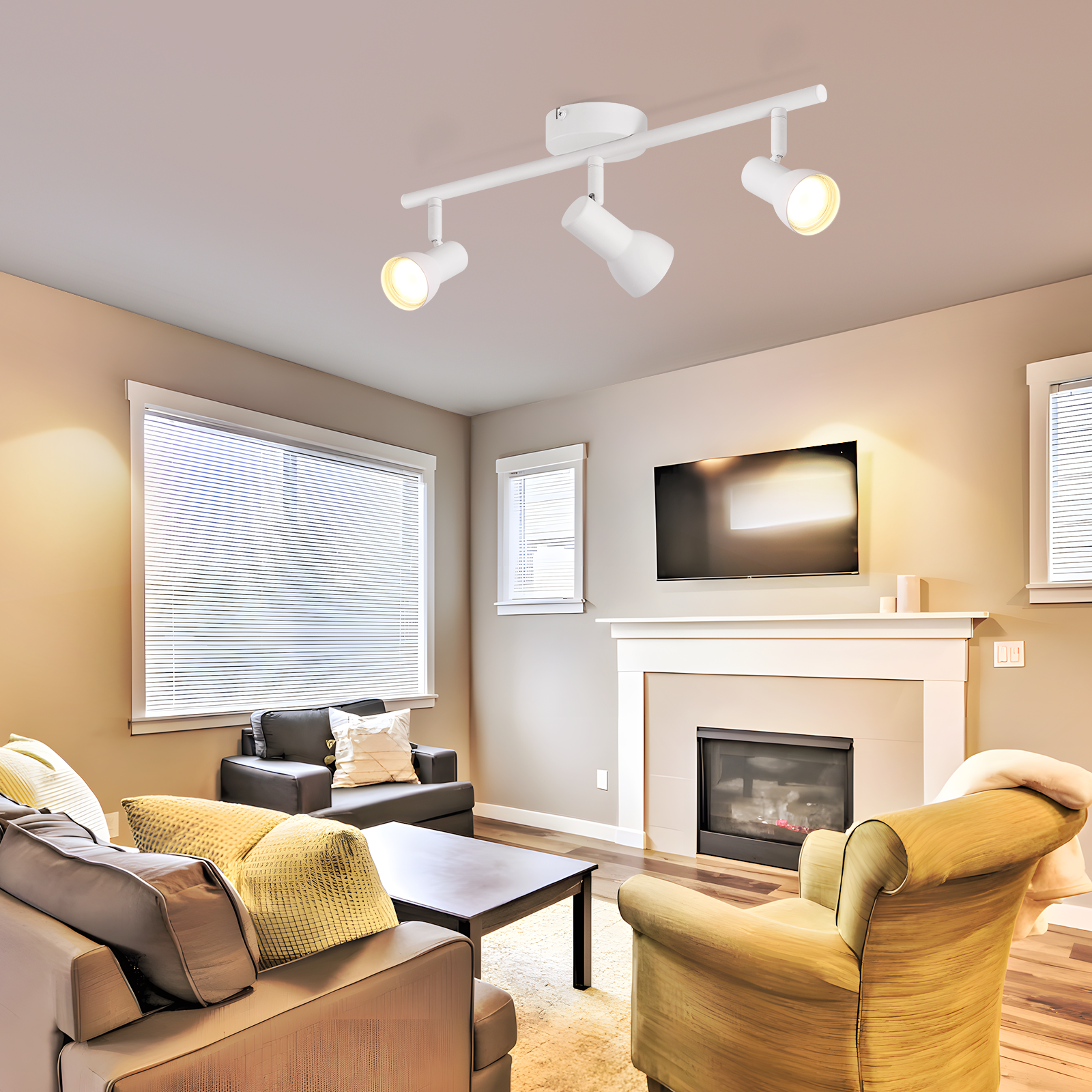 Salon z białą lampą szynową, ścianami w kolorze opalenizny i meblami w neutralnych odcieniach.