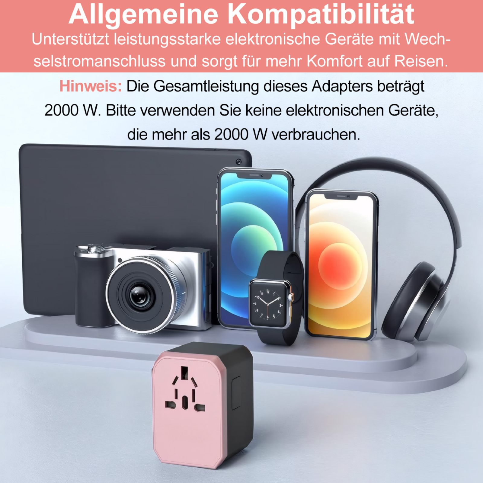 Ein Reiseadapter mit elektronischen Geräten darum herum, darunter eine Kamera, ein Telefon und Kopfhörer.