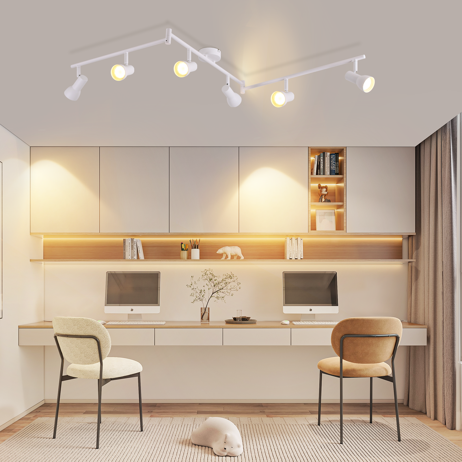 Uno spazio ufficio moderno con scrivanie bianche, due sedie, computer e illuminazione a binario sul soffitto.