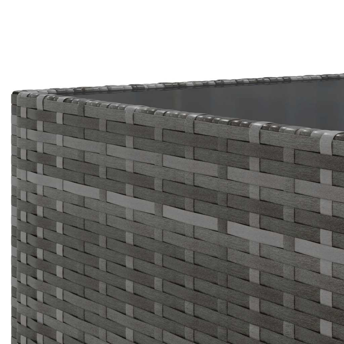 Un primer plano de mimbre gris con un patrón tejido, que muestra textura y detalles.