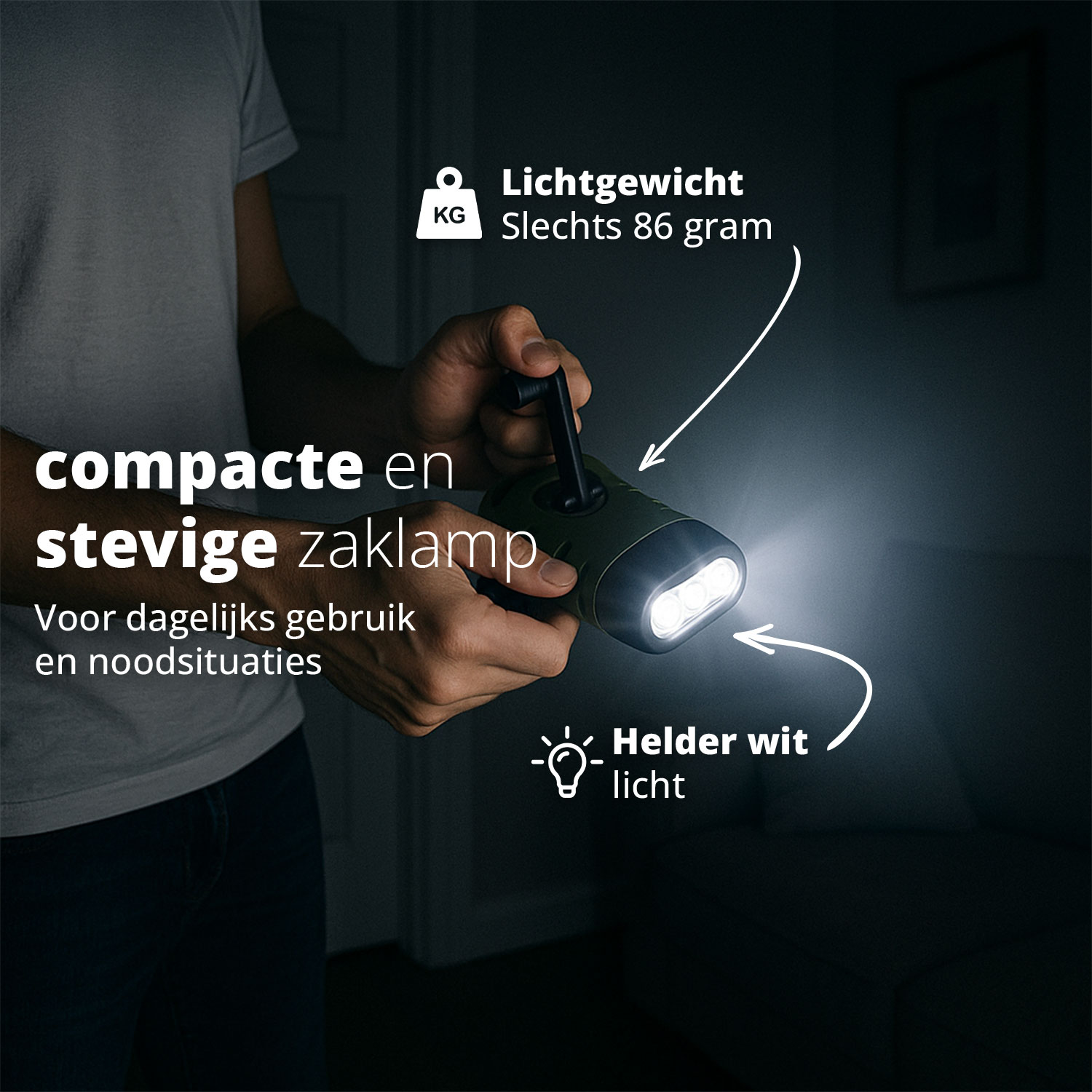 A person cranks a compact, green hand-crank flashlight, producing a bright white light in a dark setting.