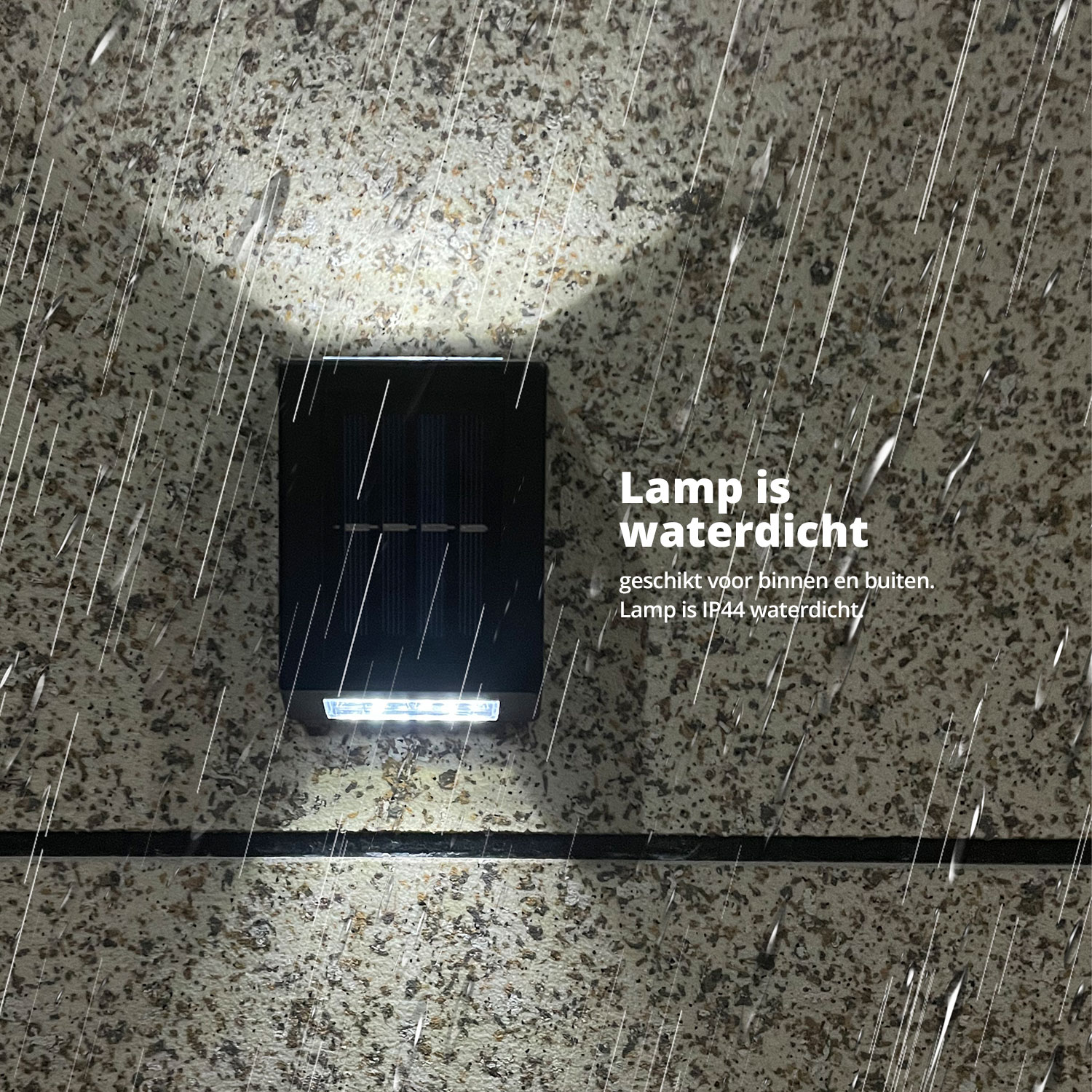 A black solar light mounted on a textured wall in the rain.