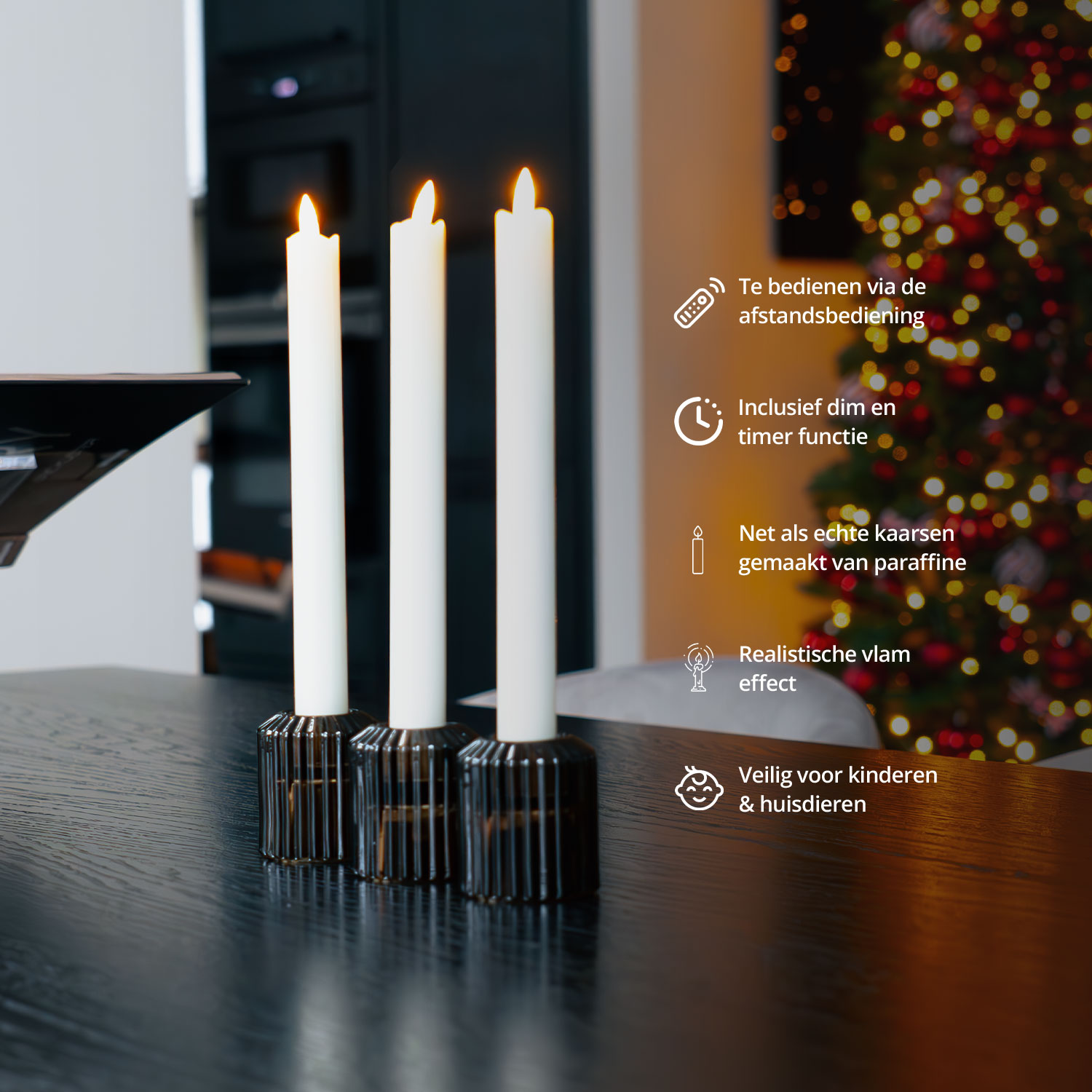 Three white LED candles in black holders on a black table.