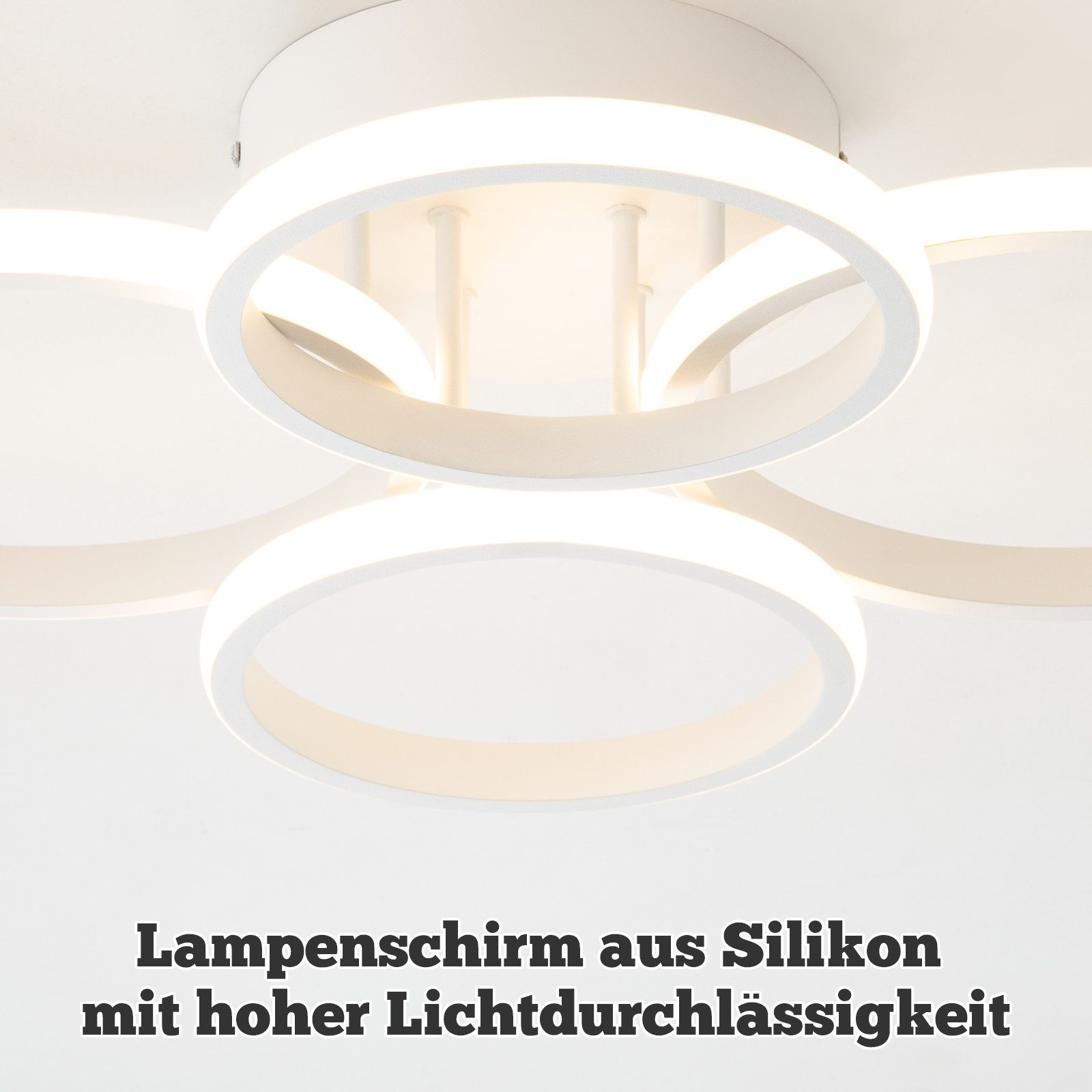 Eine weiße Deckenleuchte mit kreisförmigem Design. Das Licht ist an und beleuchtet die Decke. Der Text sagt 'Lampenschirm aus Silikon'.