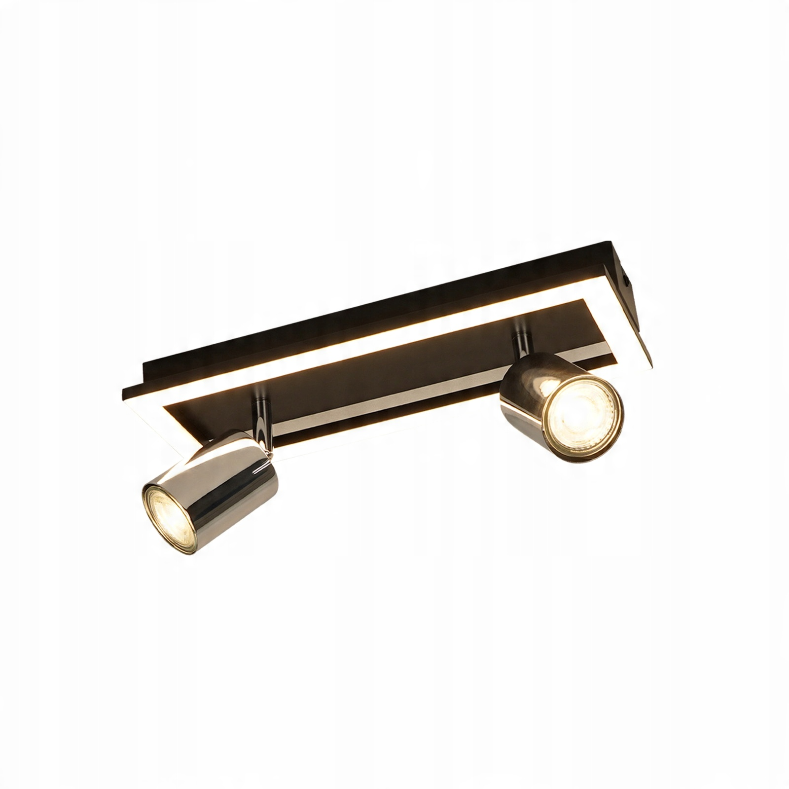 Un apparecchio per illuminazione a soffitto rettangolare nero con due faretti. I faretti brillano intensamente.
