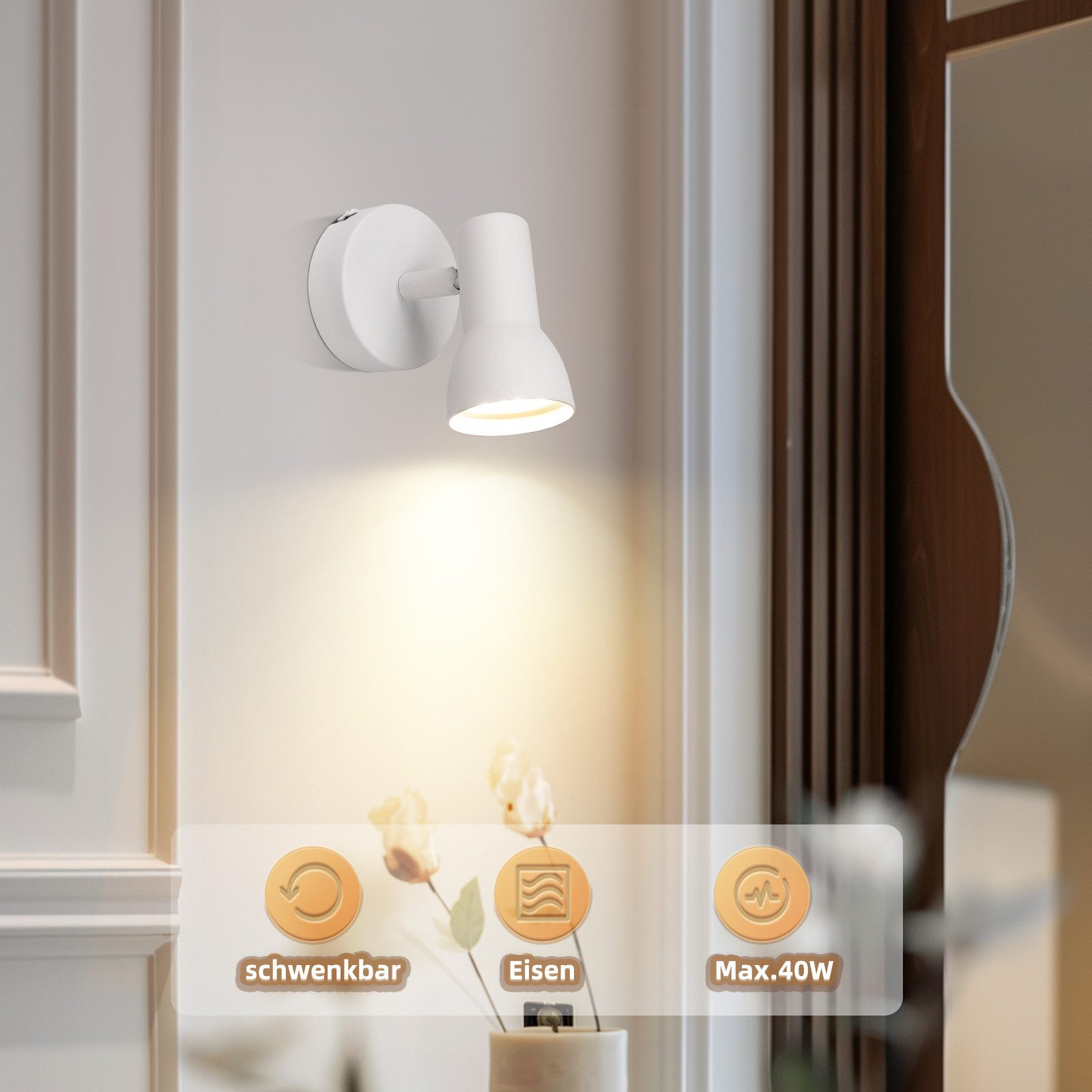 Un faretto bianco montato su una parete, che illumina i fiori in un vaso sottostante.