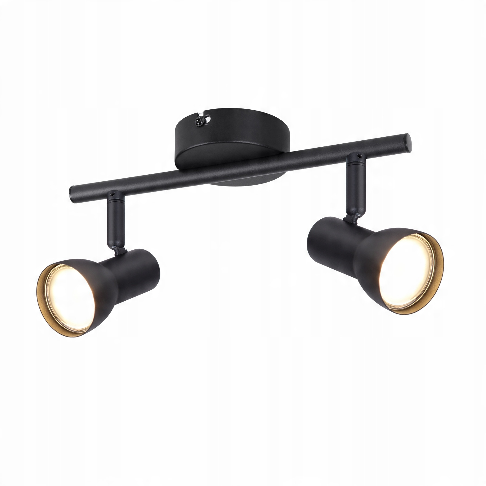 Una lampada da soffitto nera con due faretti regolabili, ciascuno dei quali proietta un raggio di luce calda.