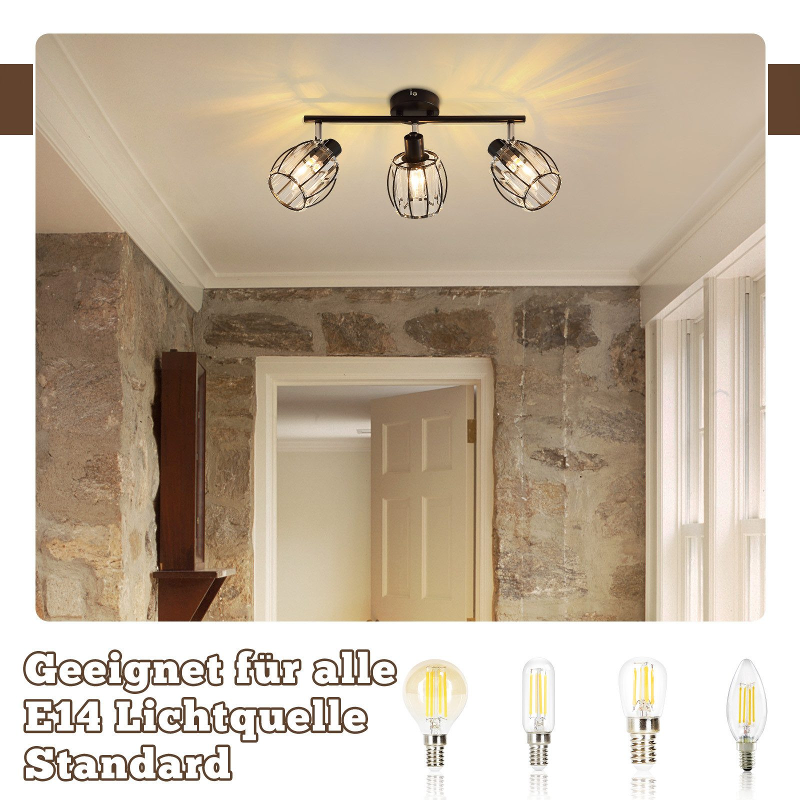 Una plafoniera con tre faretti e una varietà di lampadine. La stanza ha muri di pietra e una porta.
