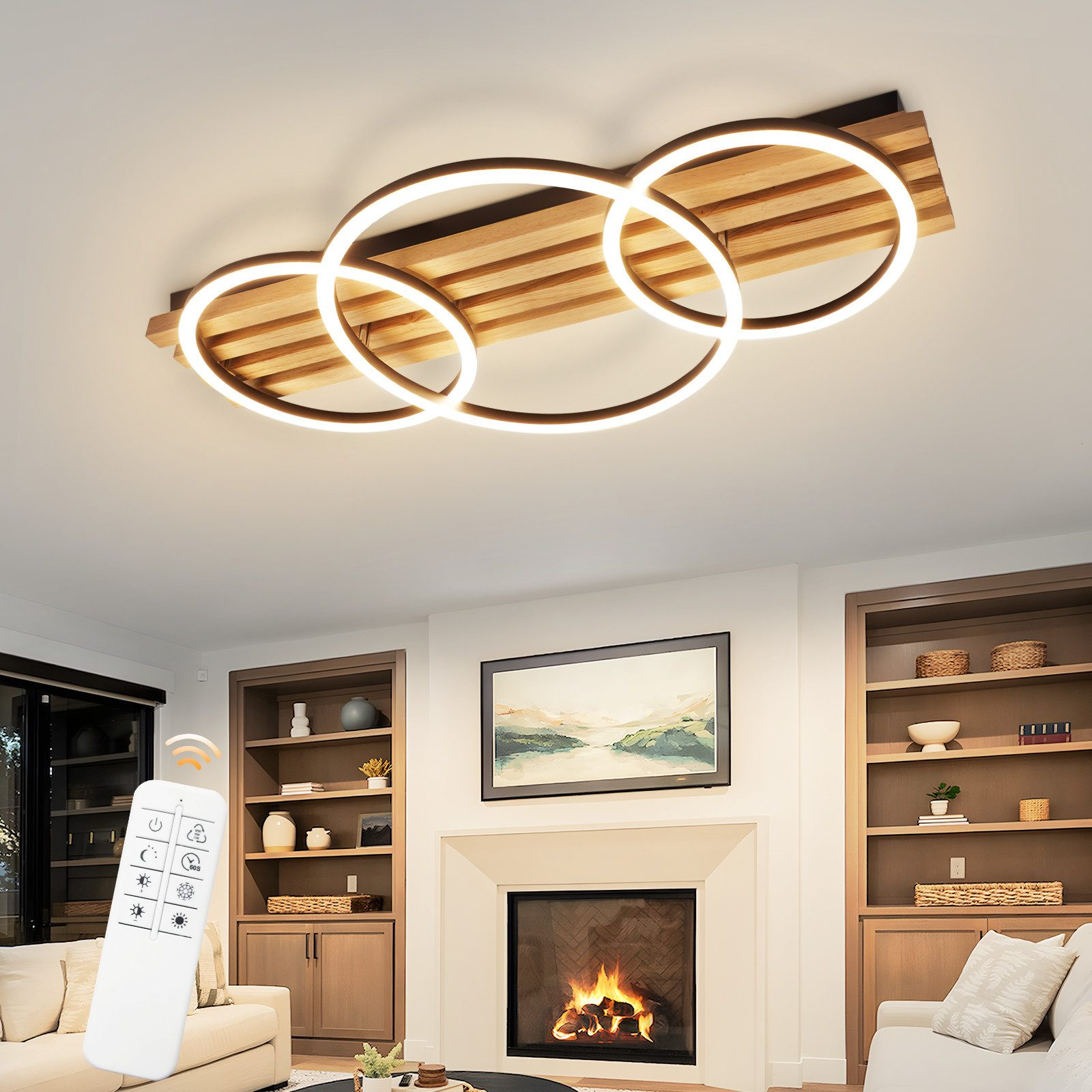 Una plafoniera con tre luci a LED circolari collegate sopra una trave di legno, in un soggiorno.