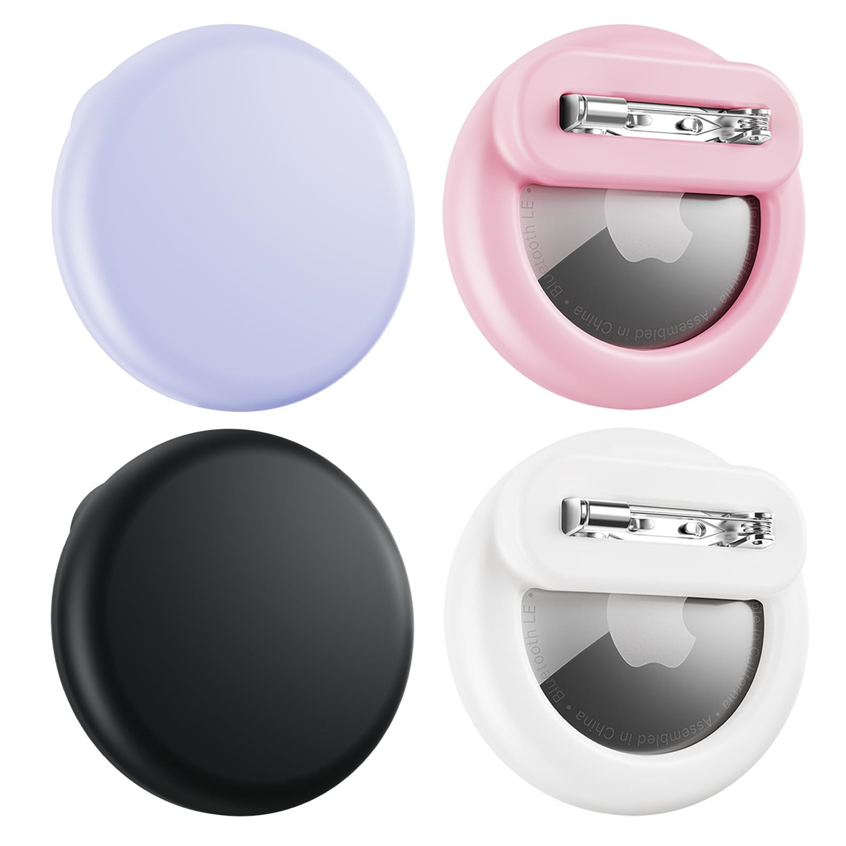 Vier farbenfrohe Apple AirTag-Halter: Lila, Pink, Schwarz und Weiß, jeder mit einer Sicherheitsnadel auf der Rückseite.
