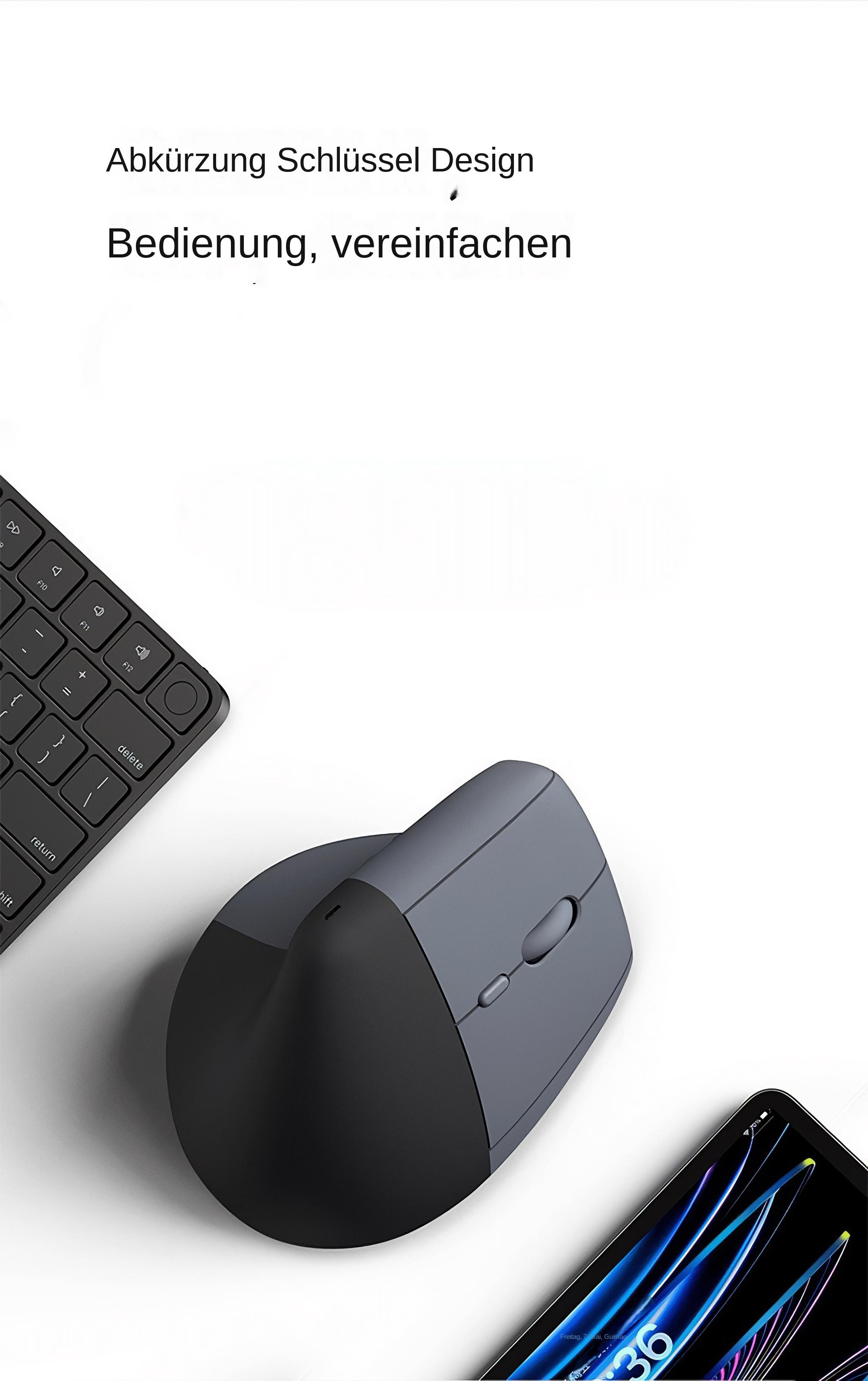Graue und schwarze ergonomische Maus neben einer Tastatur und einem Telefon, das die Uhrzeit anzeigt.