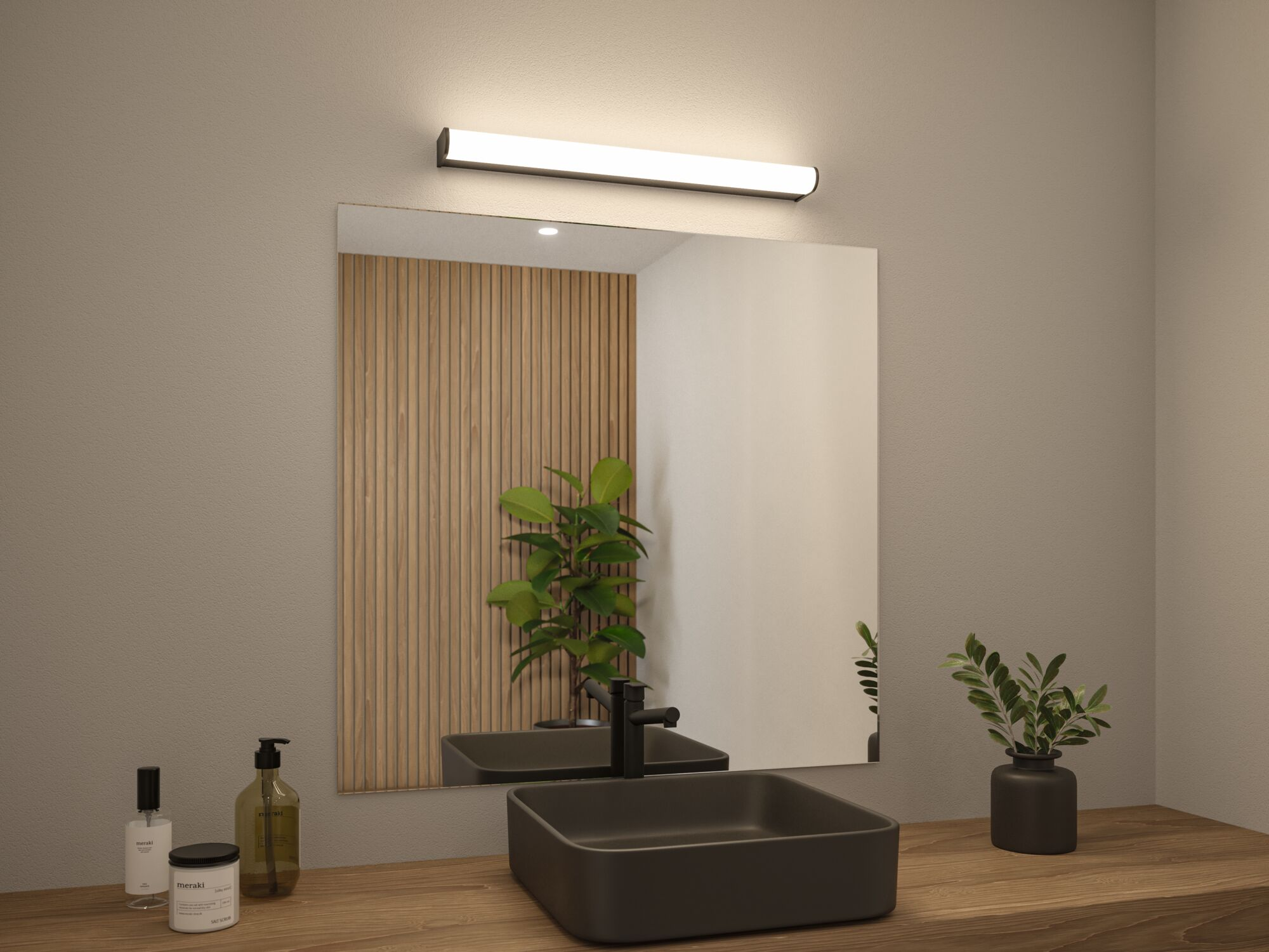Badezimmer mit quadratischem Spiegel, Waschbecken, Waschtisch, Pflanze und LED-Leuchte über dem Spiegel.