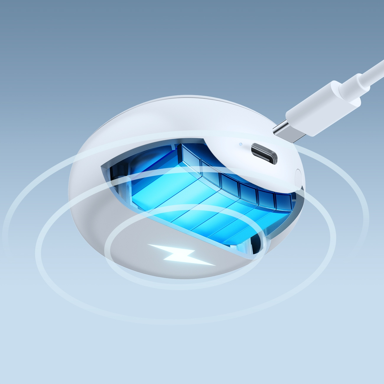 Przekrój białego etui ładującego ujawnia niebieskie baterie i biały kabel ładujący.