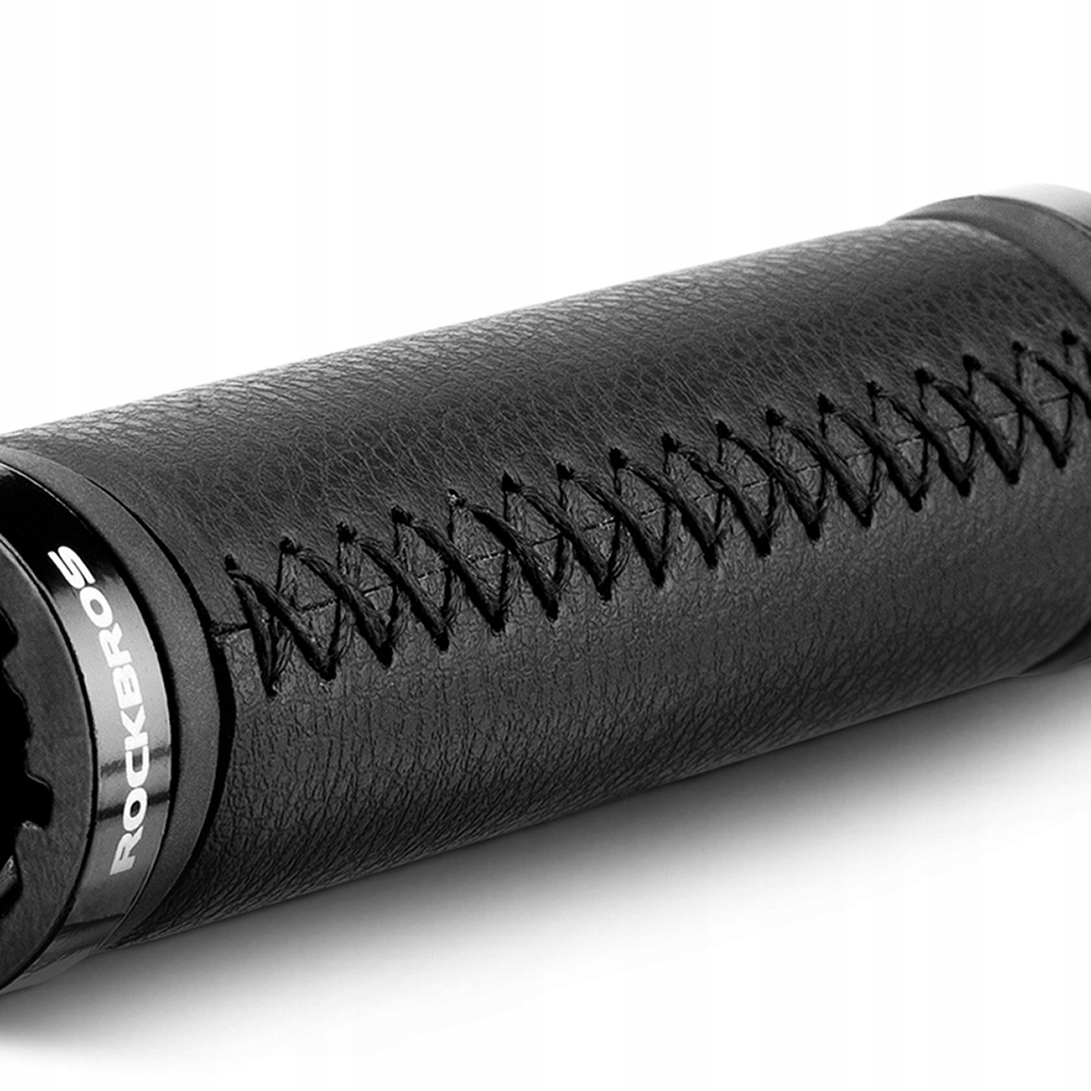 Zbliżenie czarnych uchwytów kierownicy rowerowej ROCKBROS z szytą teksturą i detalem logo.