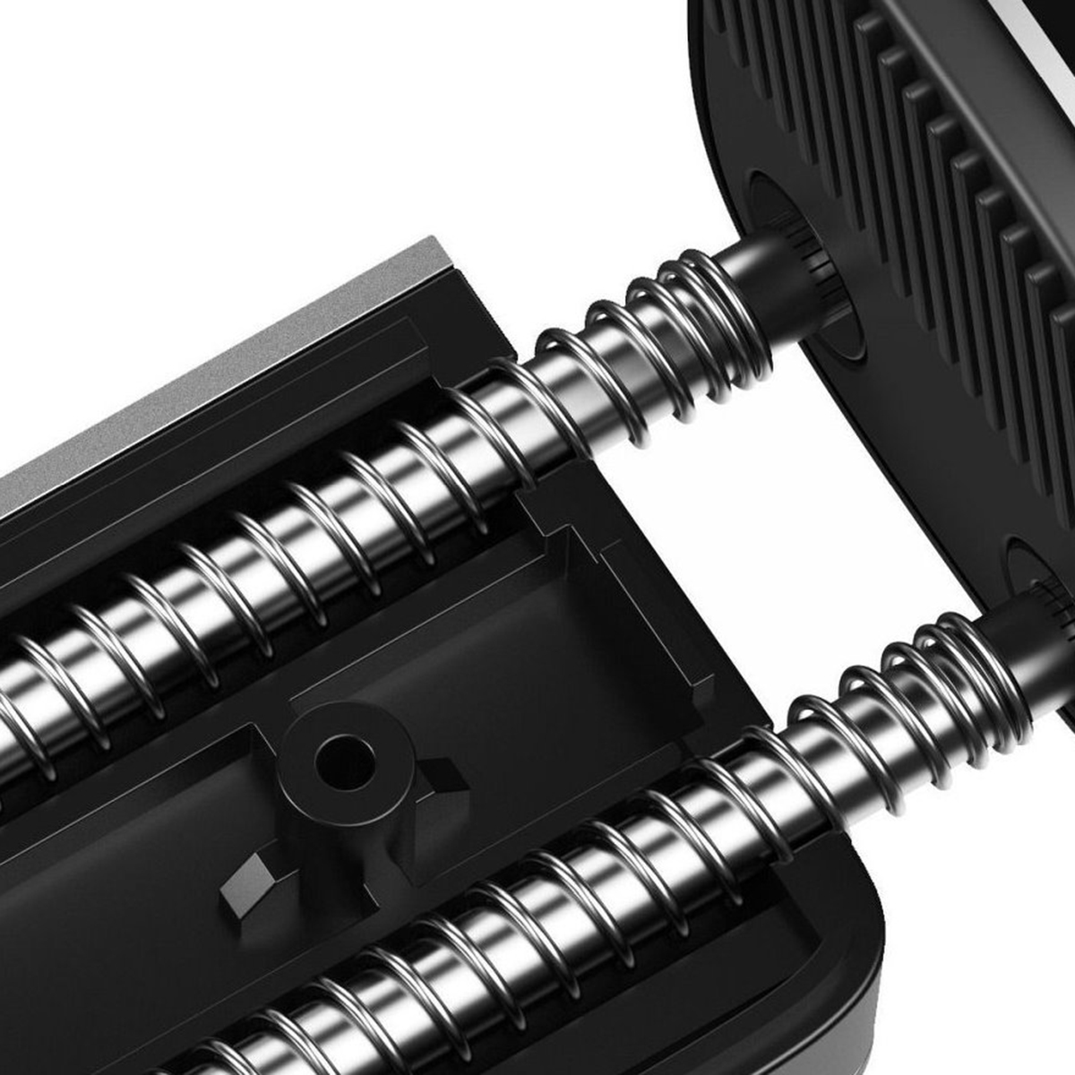 Zdjęcie z bliska czarnego uchwytu samochodowego ze srebrnymi sprężynami na białym tle.