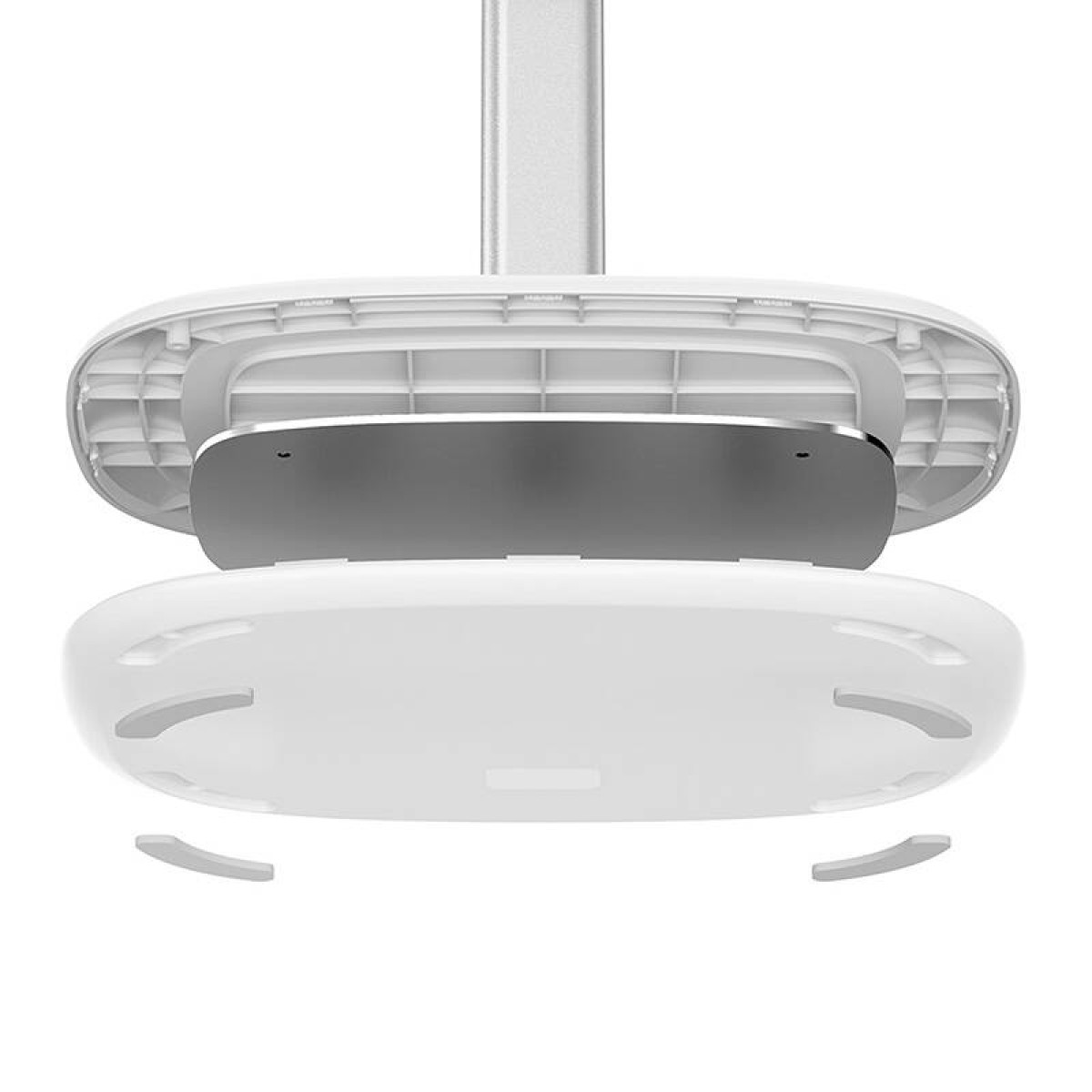 Biały przedmiot ma metalową płytkę pośrodku oraz zaokrąglony, owalny kształt z małymi, zakrzywionymi elementami.