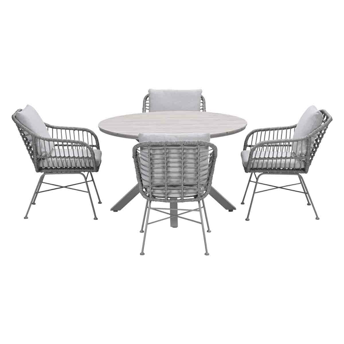 Outdoor dining set with a round table and four chairs, all in gray wicker and cushions.