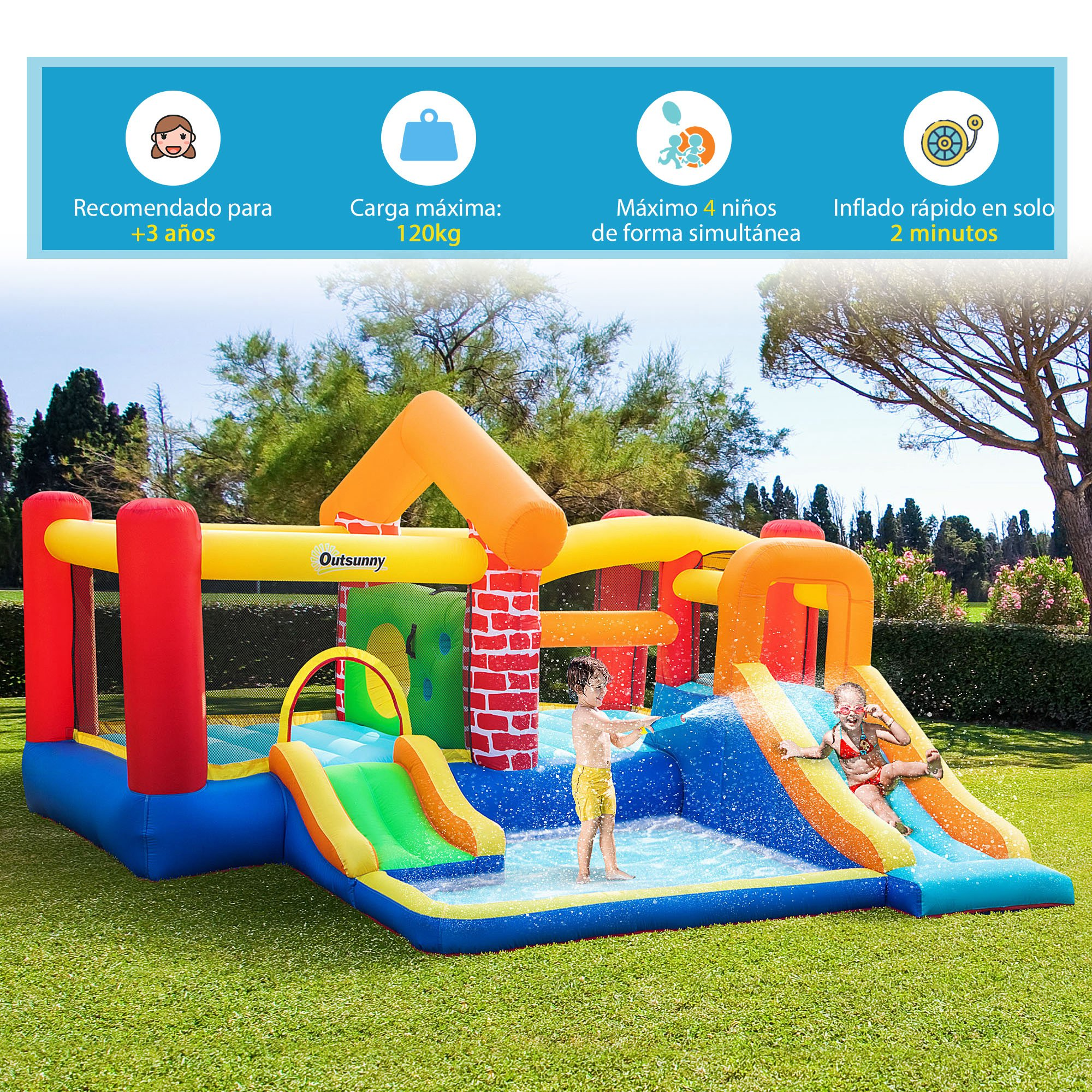 Niños jugando en un parque acuático inflable con toboganes y piscina en un jardín verde.