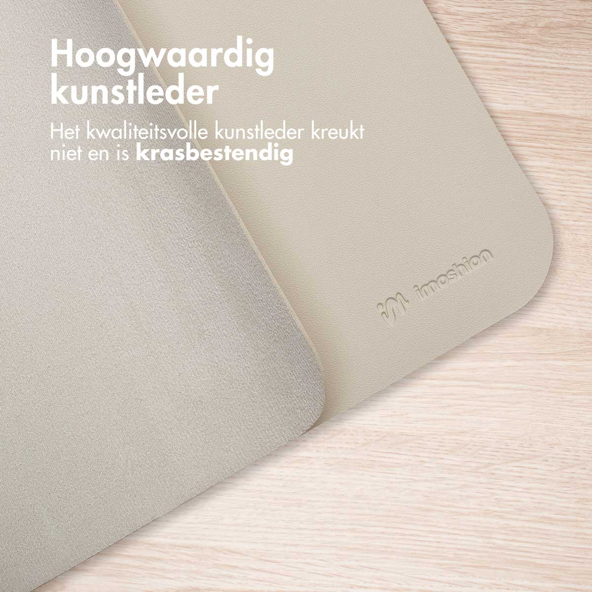 Close-up of beige faux leather with embossed logo, showing texture and material quality.