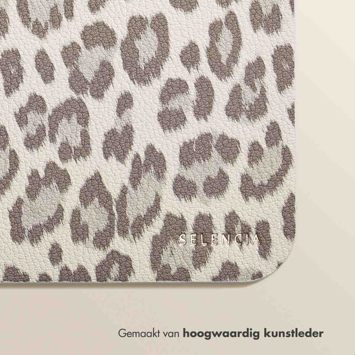 A close-up shows a leopard-print mousepad corner, emphasizing its texture.