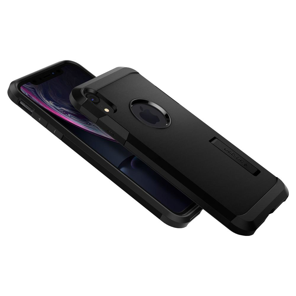 Eine schwarze Handyhülle mit einem Ständer neben einem Telefon mit einem farbenfrohen Bildschirm.