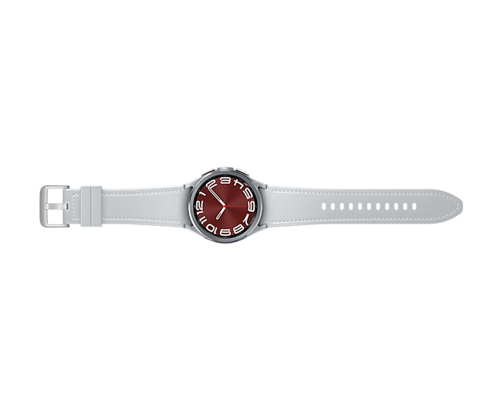 Un reloj inteligente plateado con una banda blanca y una esfera roja se muestra sobre un fondo blanco.