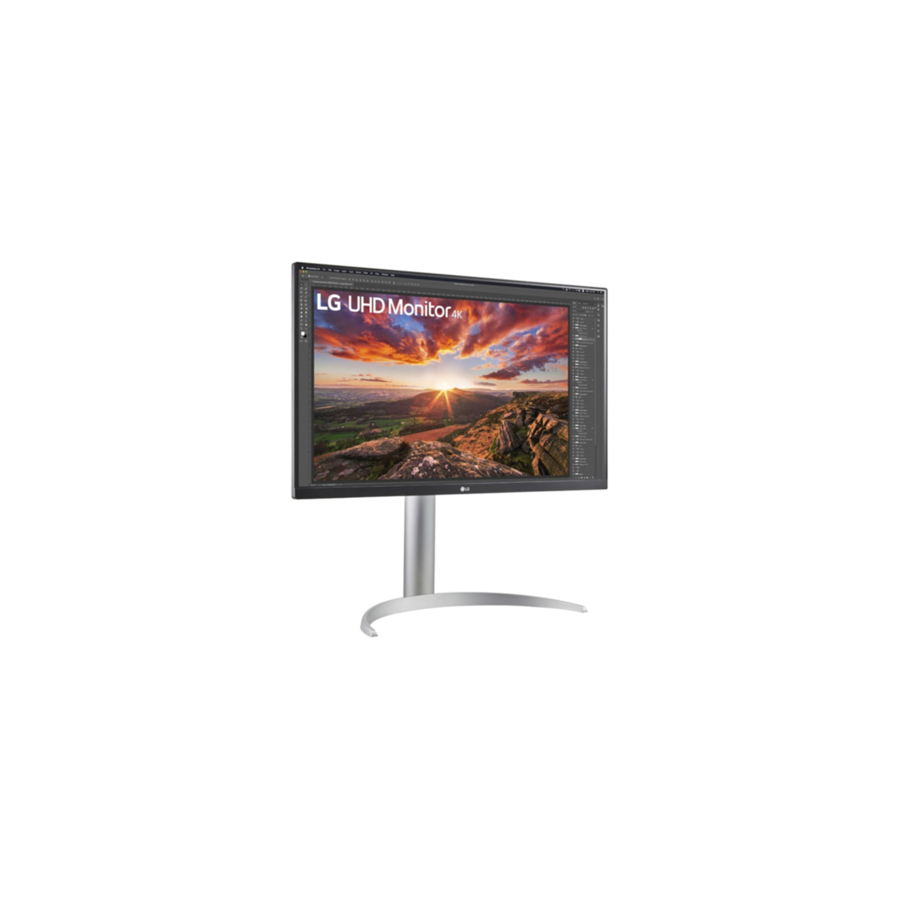 Monitor LG UHD 4K z obrazem zachodu słońca na ekranie, izolowany na białym tle.