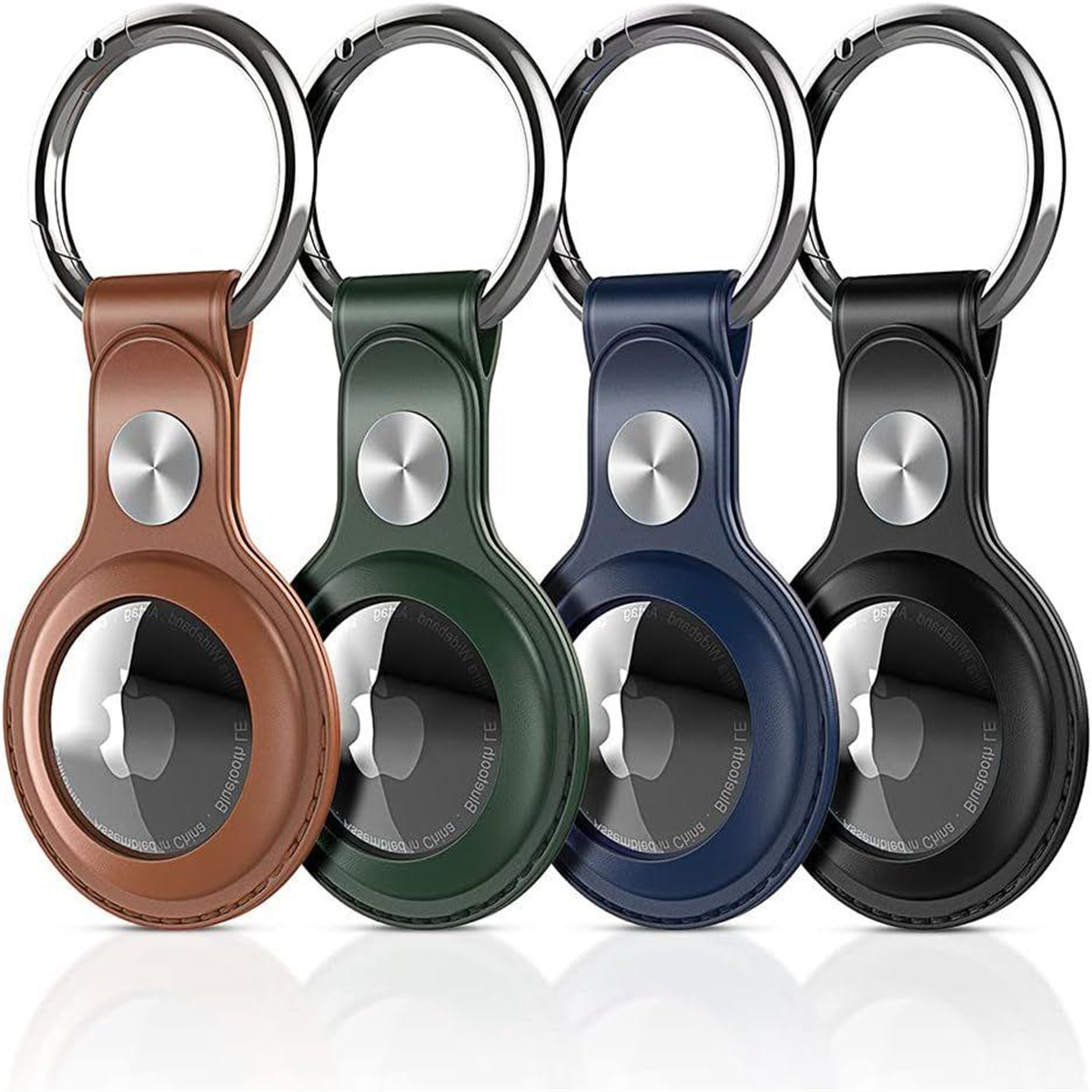 Vier AirTag-Schlüsselanhänger in Braun, Grün, Blau und Schwarz, jeder mit einem silbernen Ring.