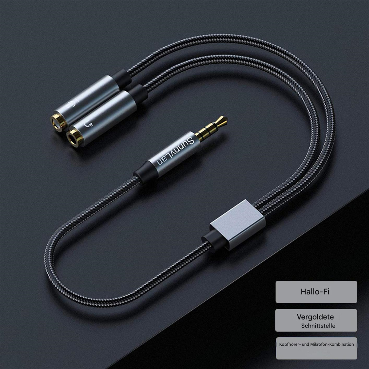 Audio-Splitterkabel mit drei Anschlüssen im silber-schwarzen Design.