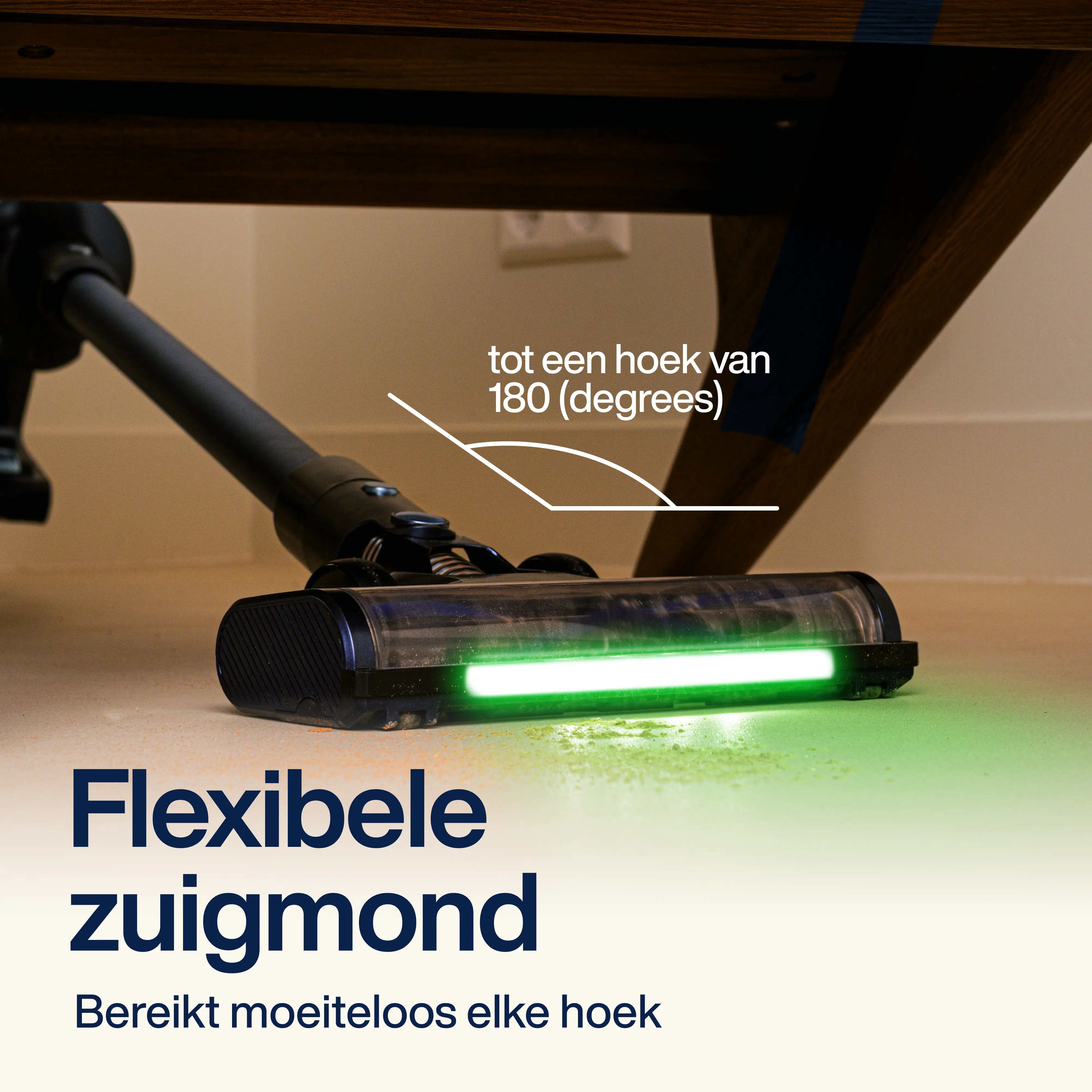 Vacuum cleaner head with LED under a table, showing its flexible reach. The head has green light for dirt detection.