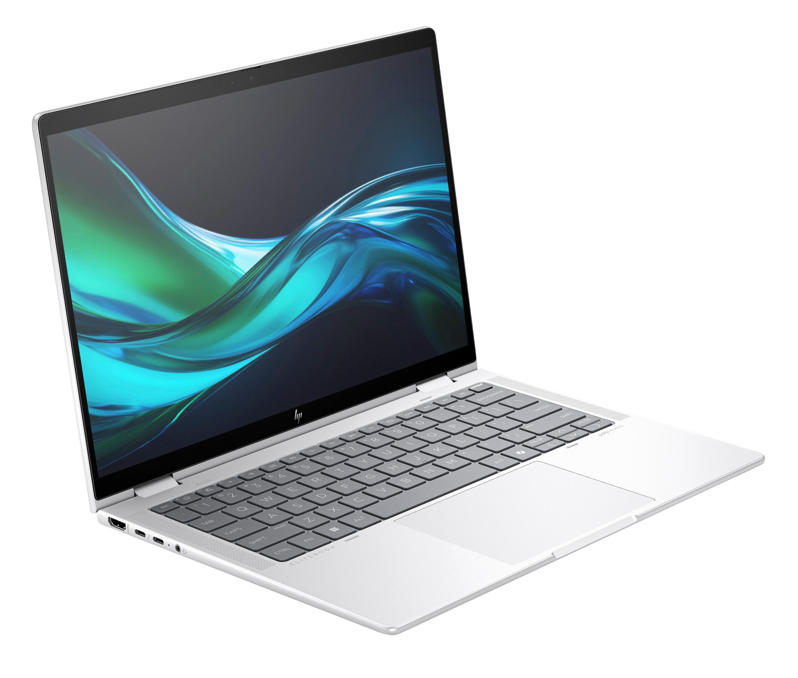 Silberner Laptop mit Bildschirm, der ein grünes und blaues abstraktes Bild zeigt, offen auf einer weißen Oberfläche.