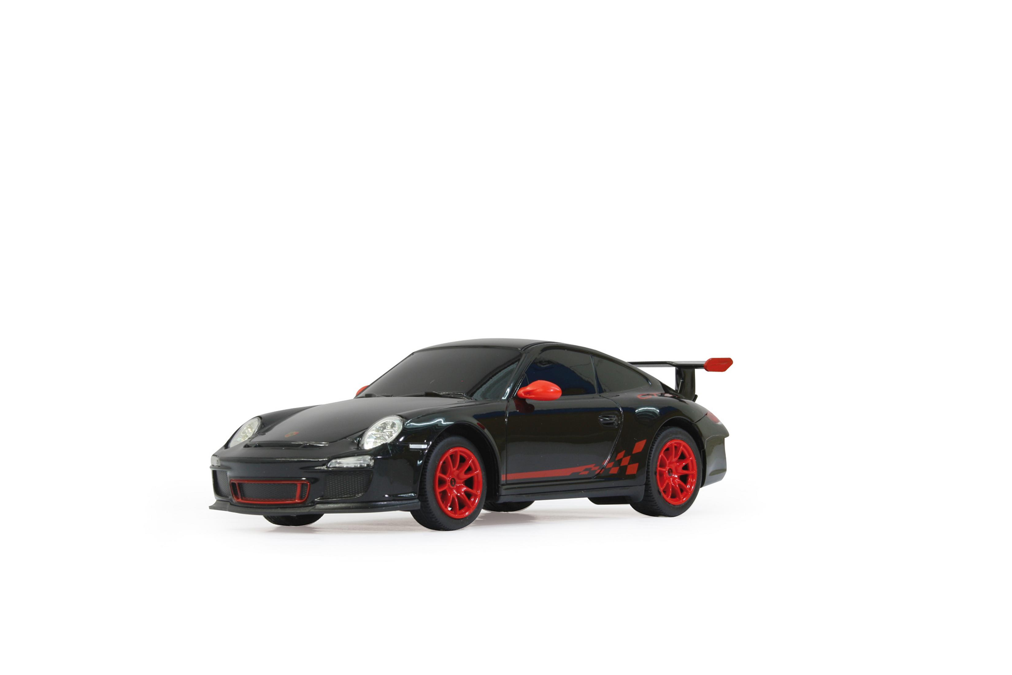 Ein schwarzes Porsche-Spielzeugauto mit roten Rädern auf Weiß.