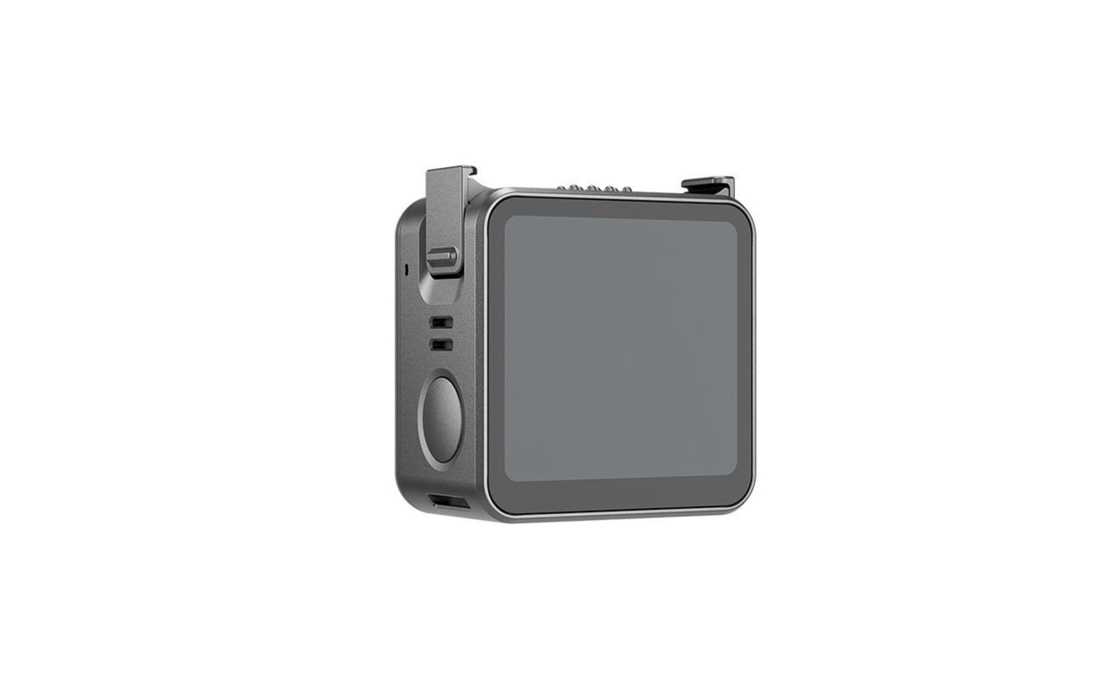 Una action camera grigia con schermo e pulsanti su sfondo bianco. La fotocamera è leggermente angolata.