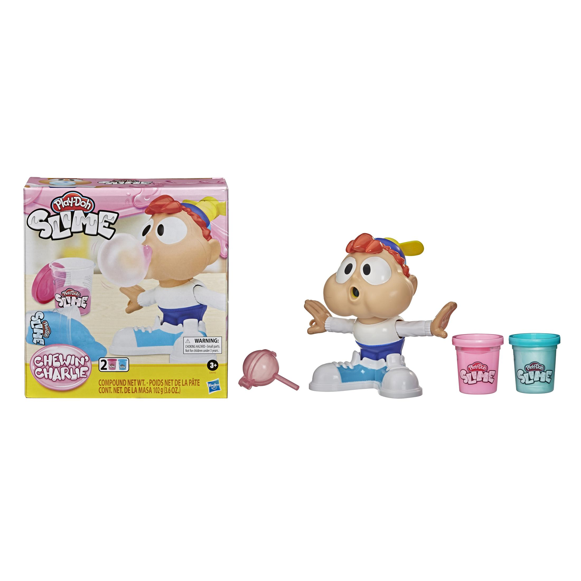 Spielzeugset mit einer Figur, die eine Blase bläst, sowie Schleimbehältern und einem Lutscher, mit Produktbox links.
