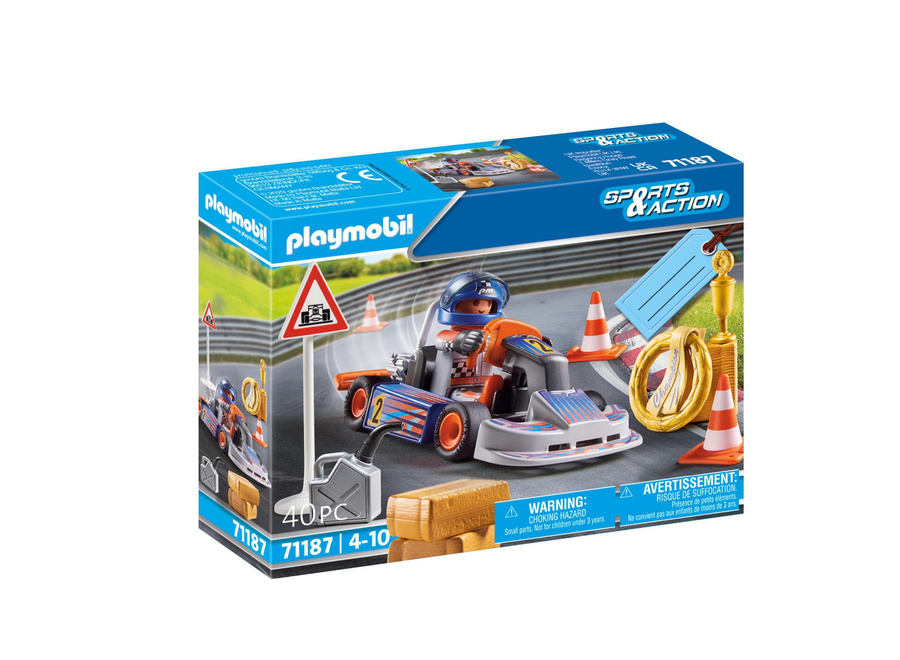 Beyaz bir zemin üzerinde bir yarış arabası, sürücü ve aksesuarlarla kutulu Playmobil go-kart seti.