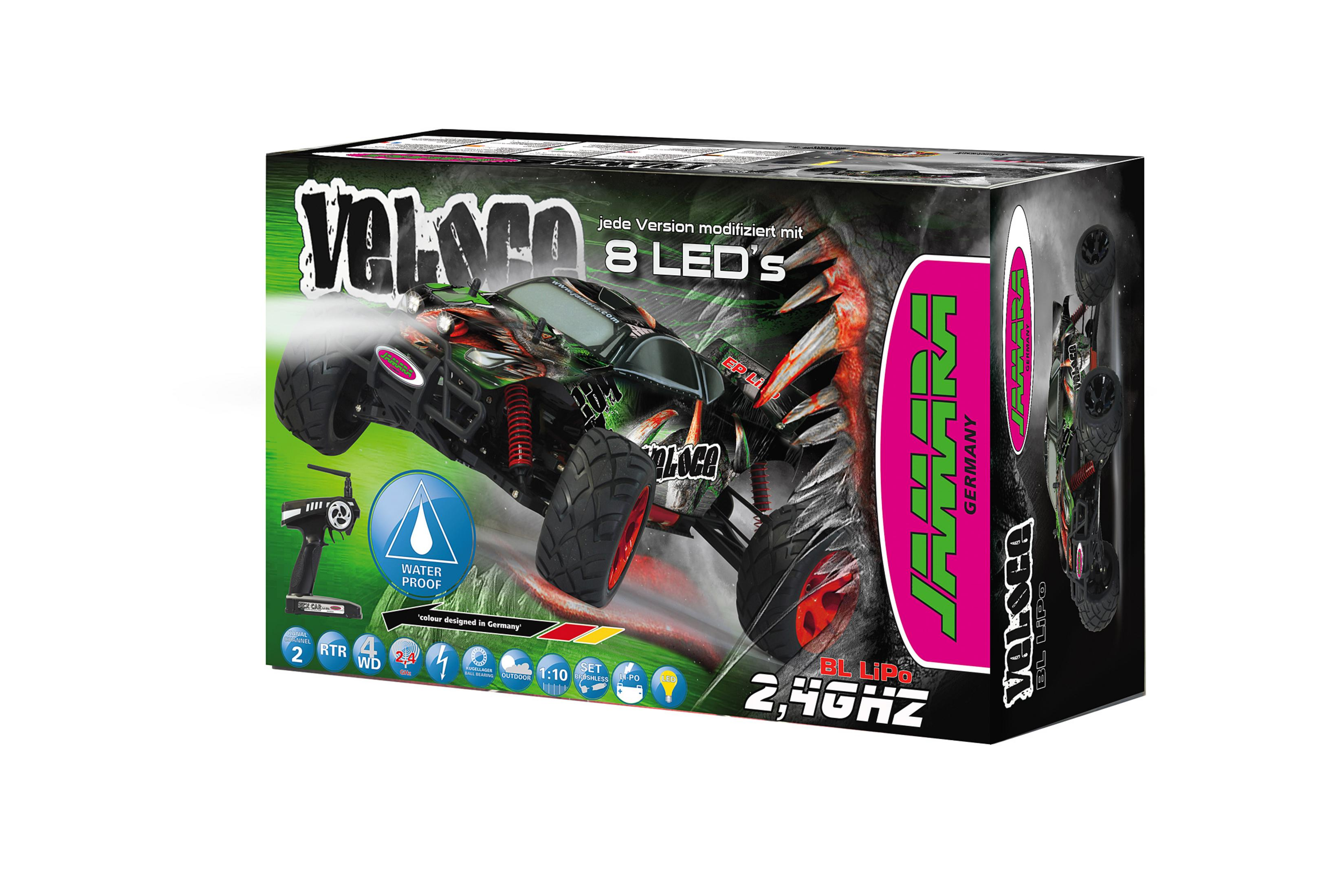 Karton mit einem schwarzen und grünen Spielzeugauto mit roten Akzenten, beschriftet mit "Velocis" und "Jamara".