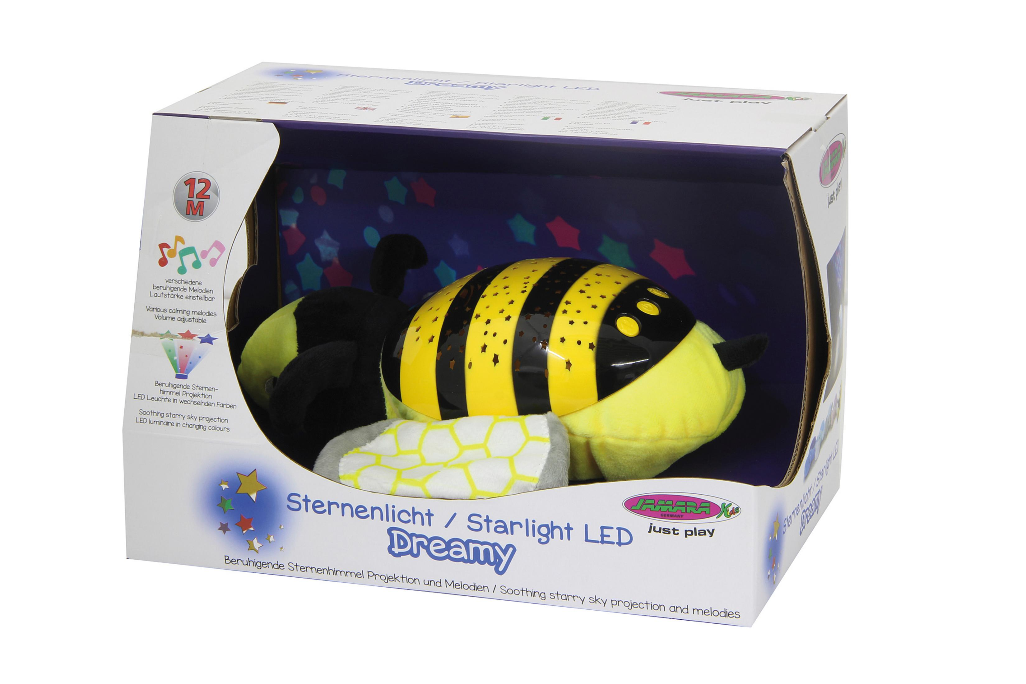 Ein Plüschbienenspielzeug in einer Schachtel mit der Aufschrift „Sternenlicht / Starlight LED Dreamy“ mit Produktinformationen.