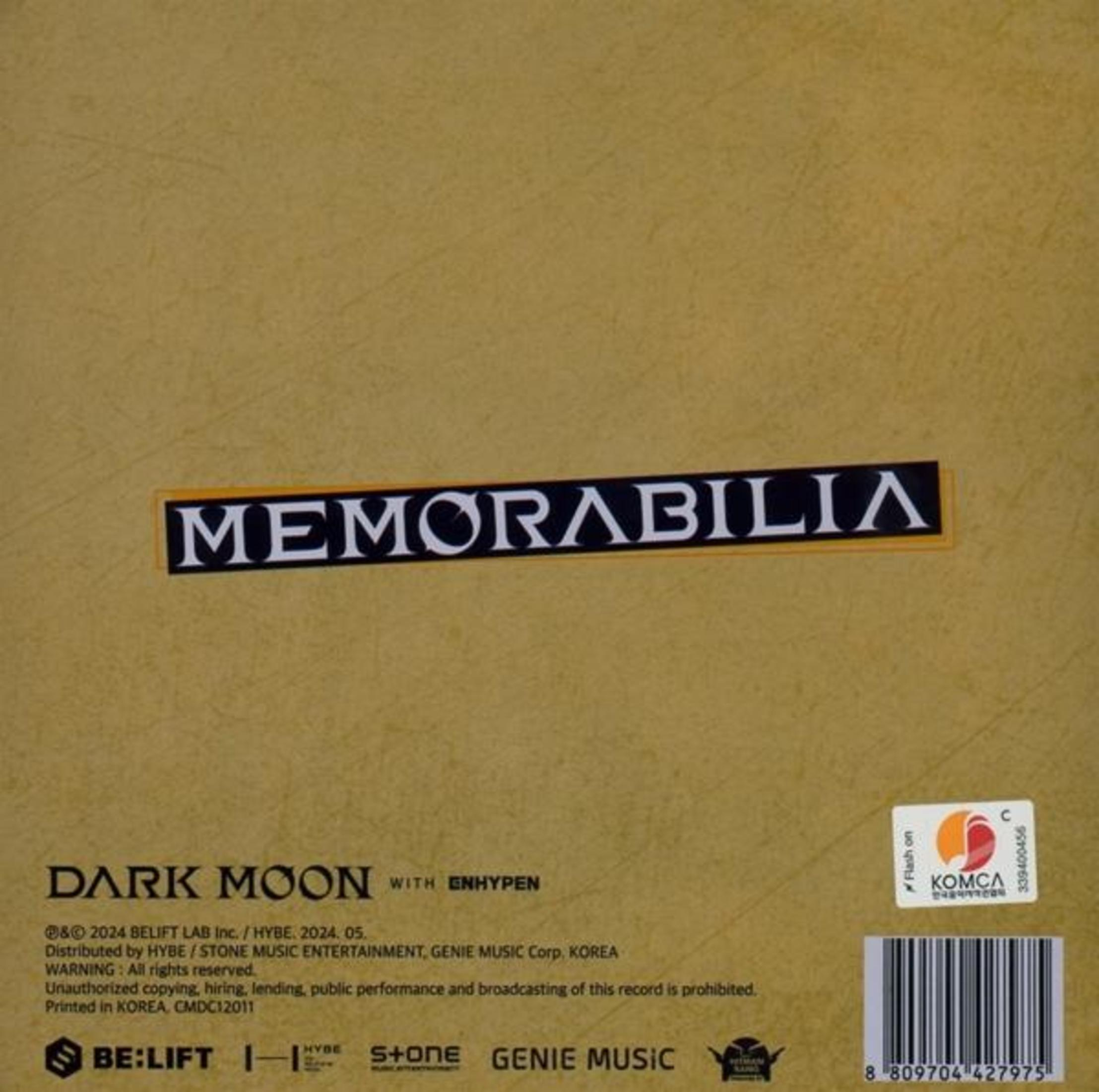 Album back cover showing text "Memorabilia" and "Dark Moon with Enhypen" on a gray background with copyright info.