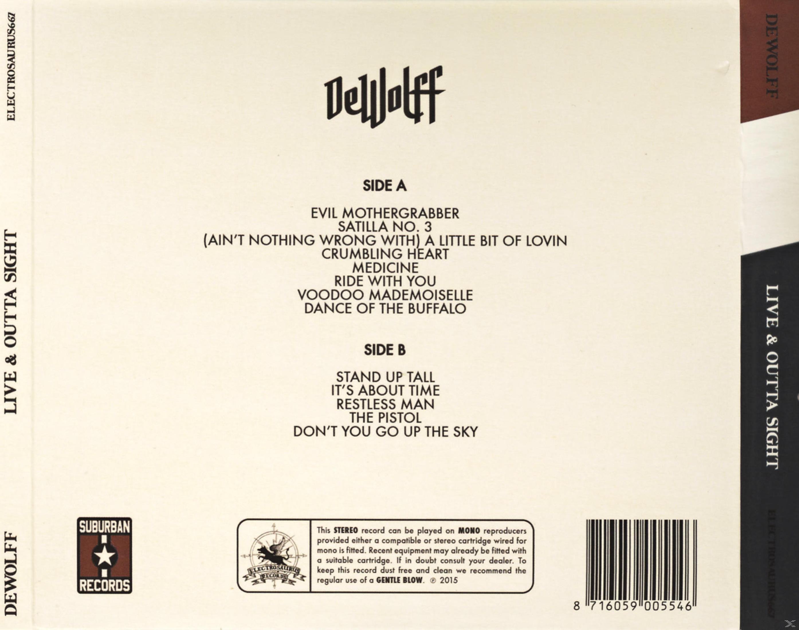 Achterkant van het vinylalbum "Live & Outta Sight" van DeWolff, met tracklist en informatie over het platenlabel.