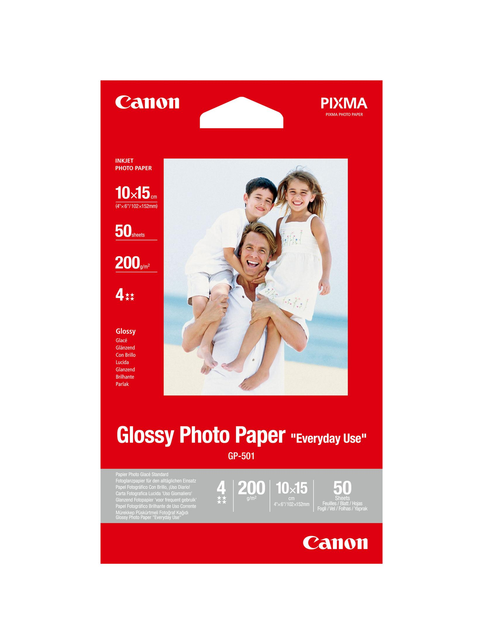 Canon Glossy-Fotopapierverpackung mit einem Familienfoto mit zwei Kindern und einem Mann auf rotem Hintergrund.